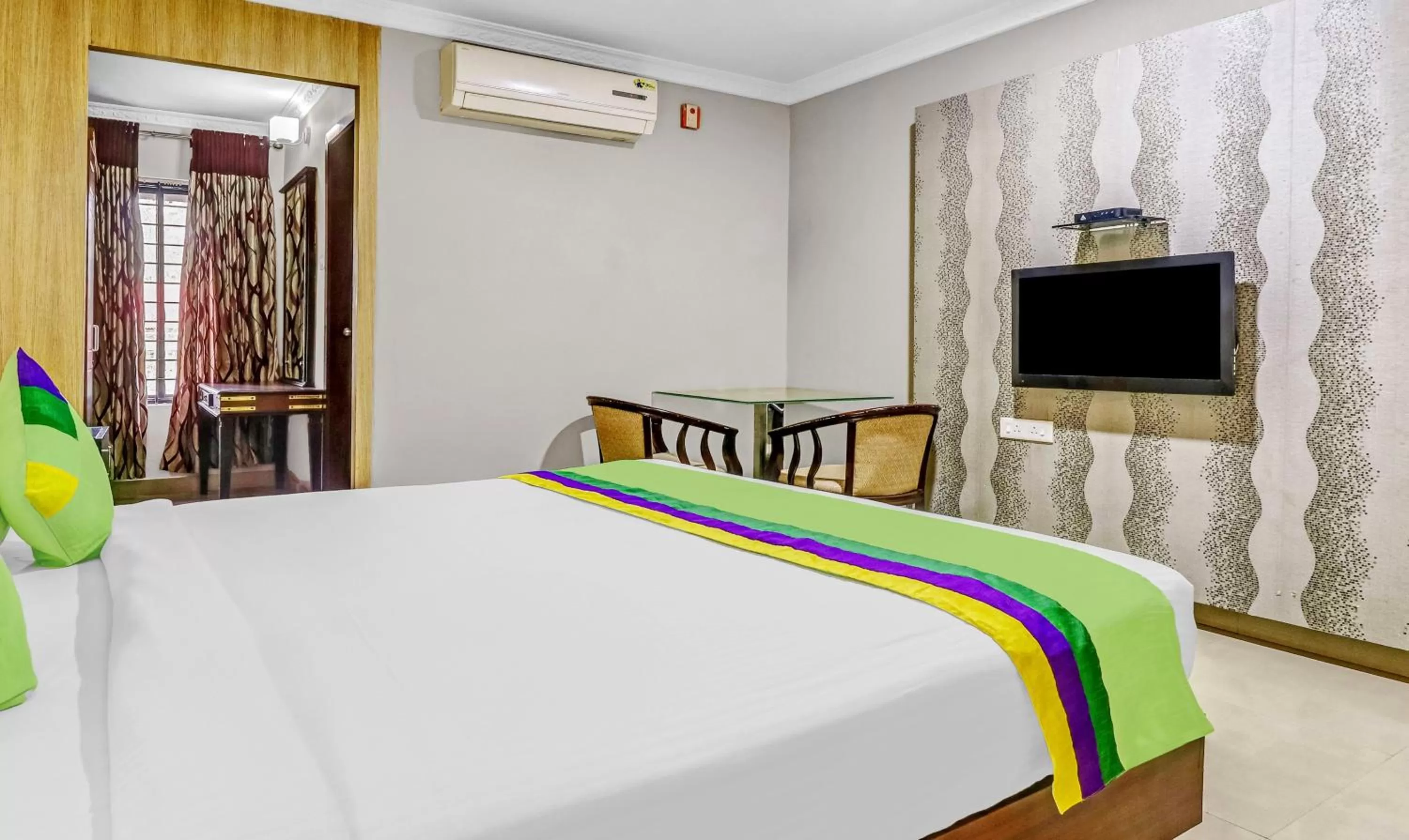 Bedroom, Bed in Treebo Symphony Hotels And Resorts Angamally