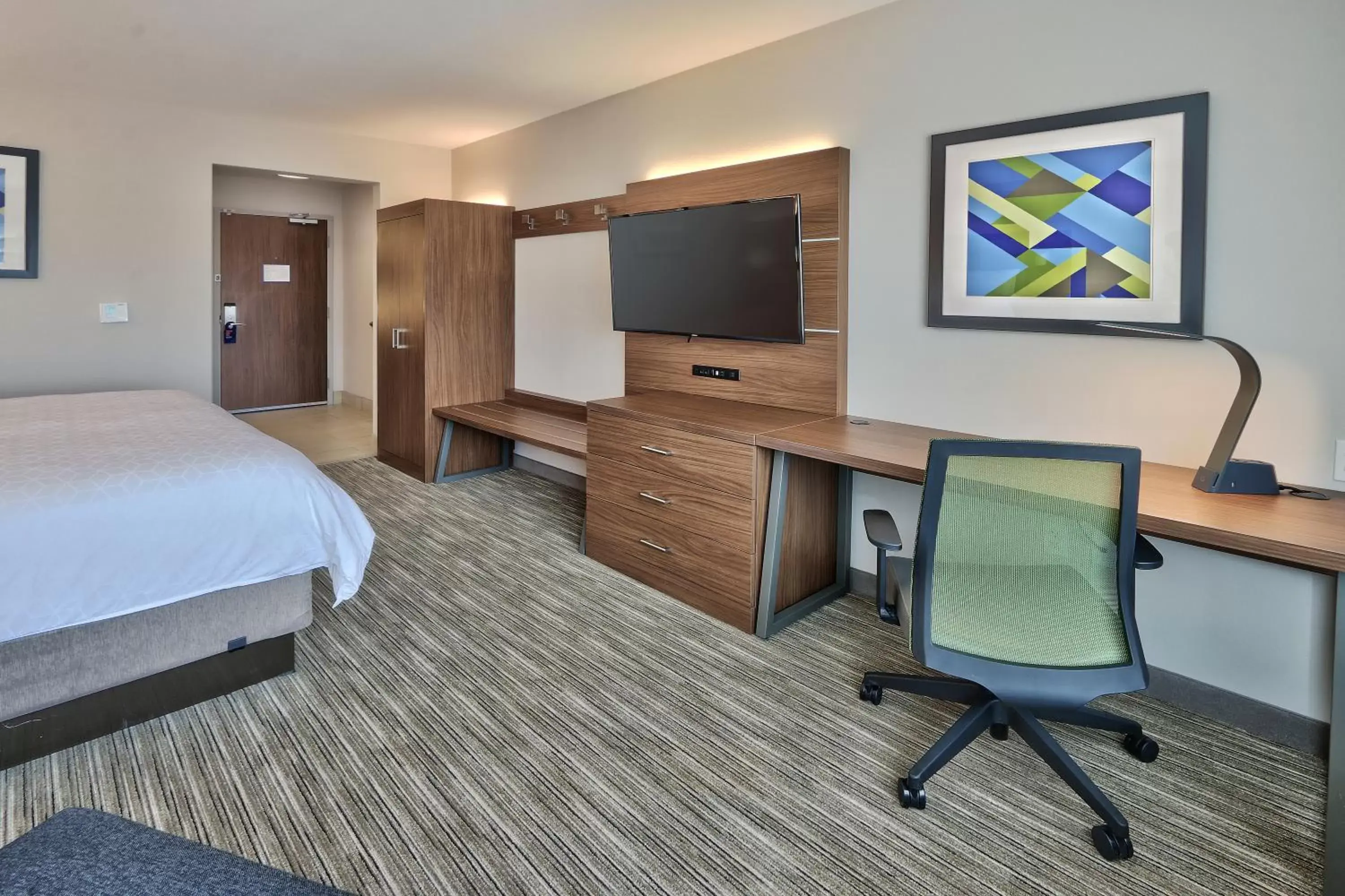 Photo of the whole room, TV/Entertainment Center in Holiday Inn Express & Suites - Albuquerque East, an IHG Hotel