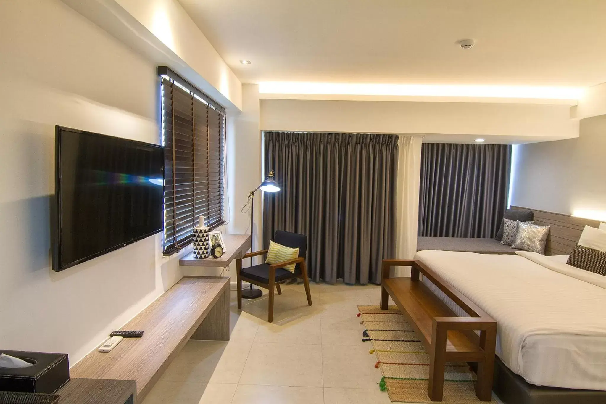 TV/Entertainment Center in Bossotel Chiang Mai - SHA Plus