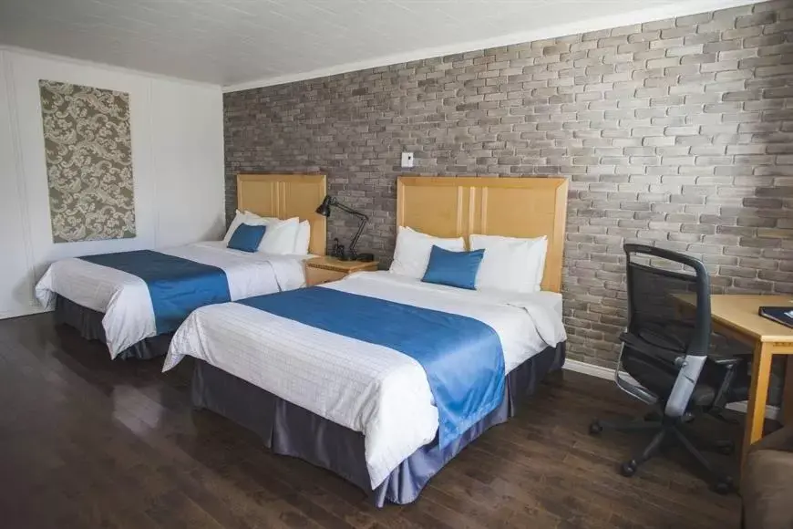 Staff, Bed in Hostellerie Baie Bleue