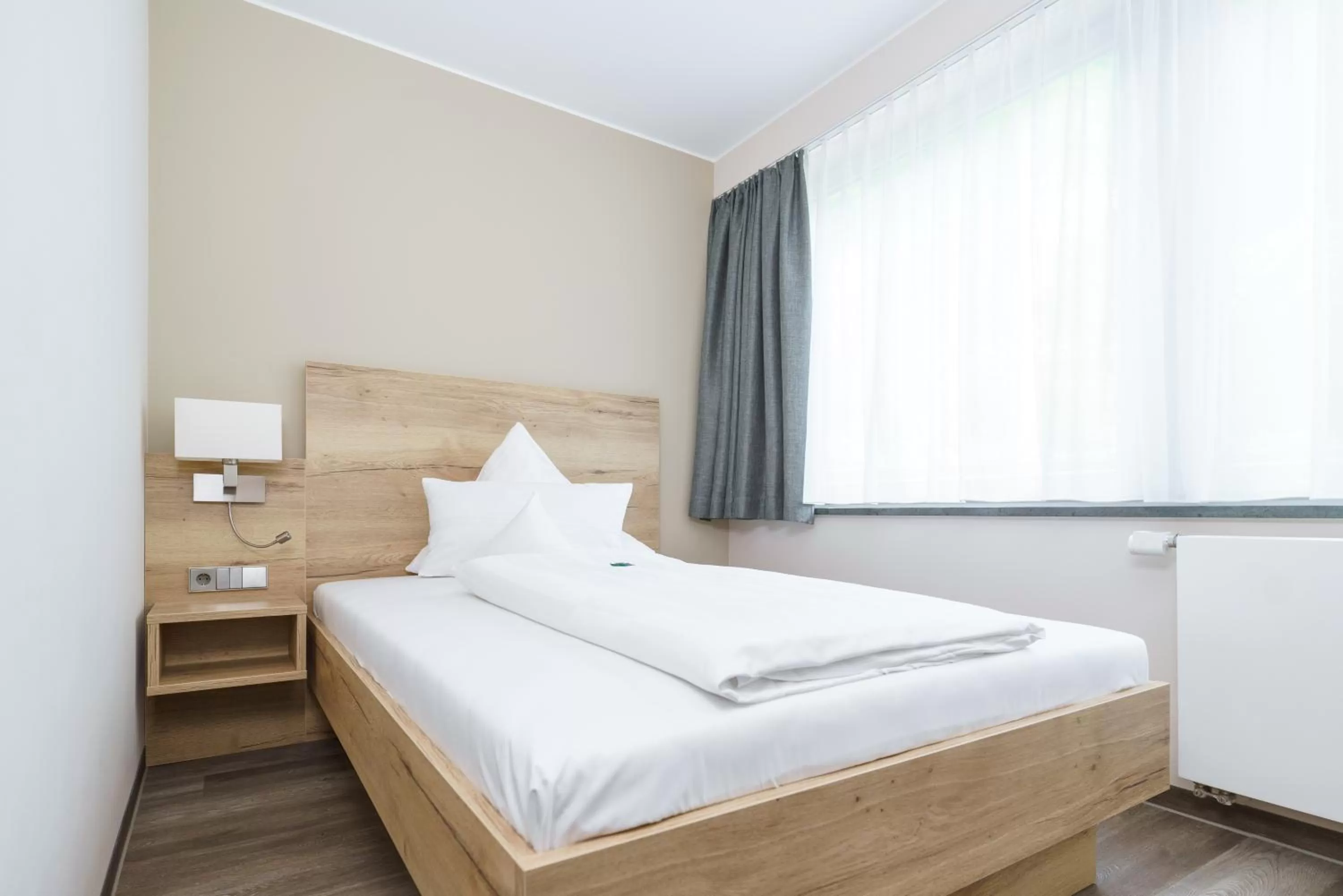 Bed in Hotel Forsthaus Grüna Betreibergesellschaft mbH