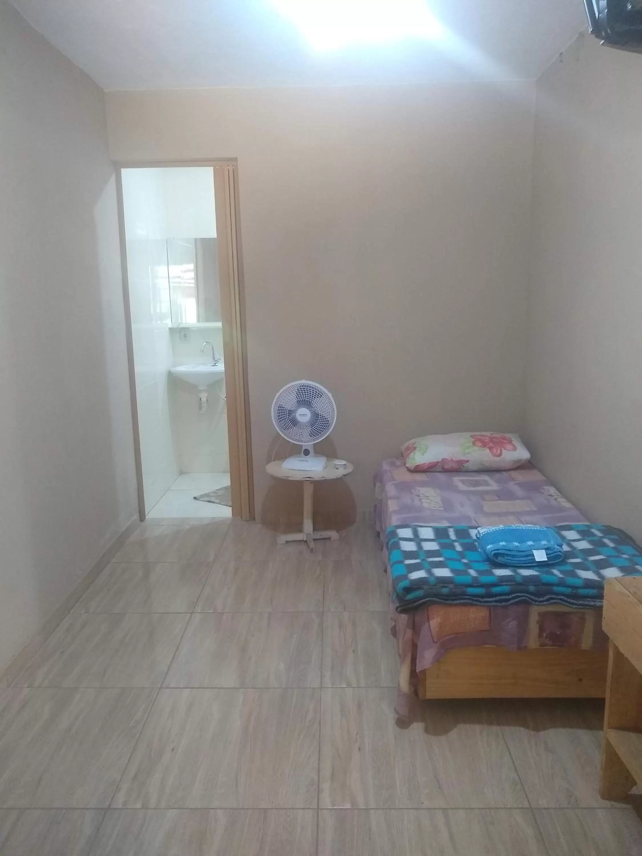 Bed in Pousada do Ribeirão