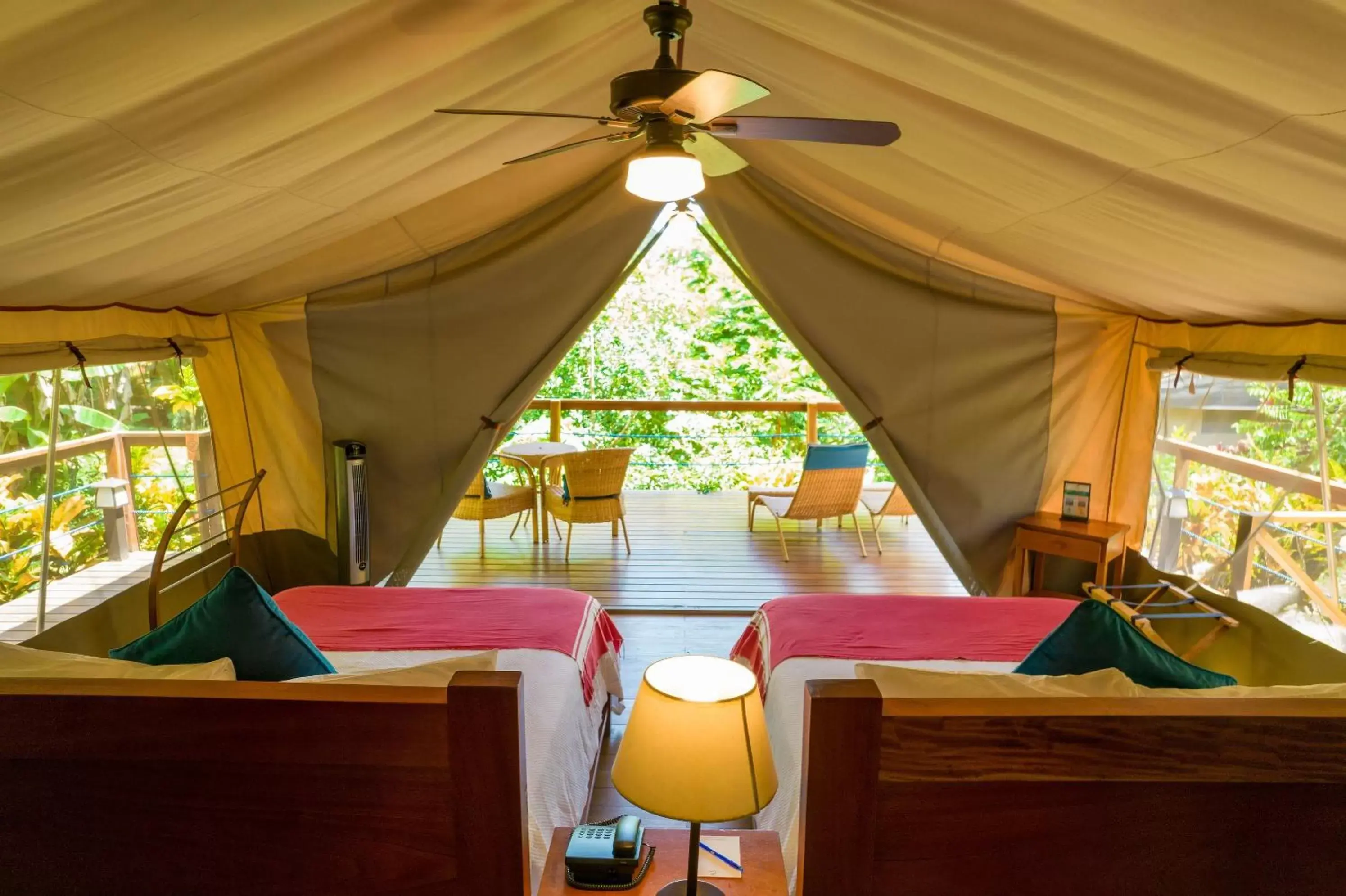 Bed, Seating Area in Isla Chiquita Glamping Hotel