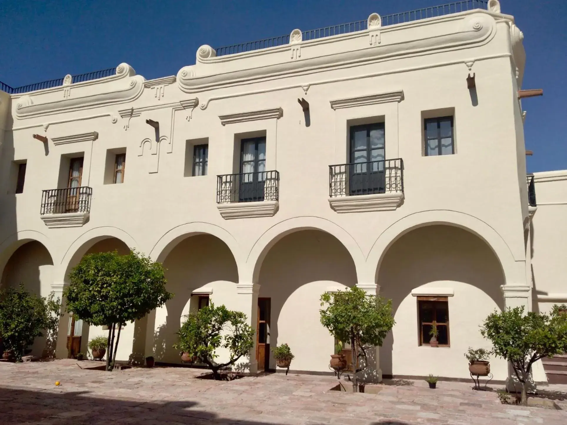 Patio, Property Building in Meson De La Merced Hotel & Suites