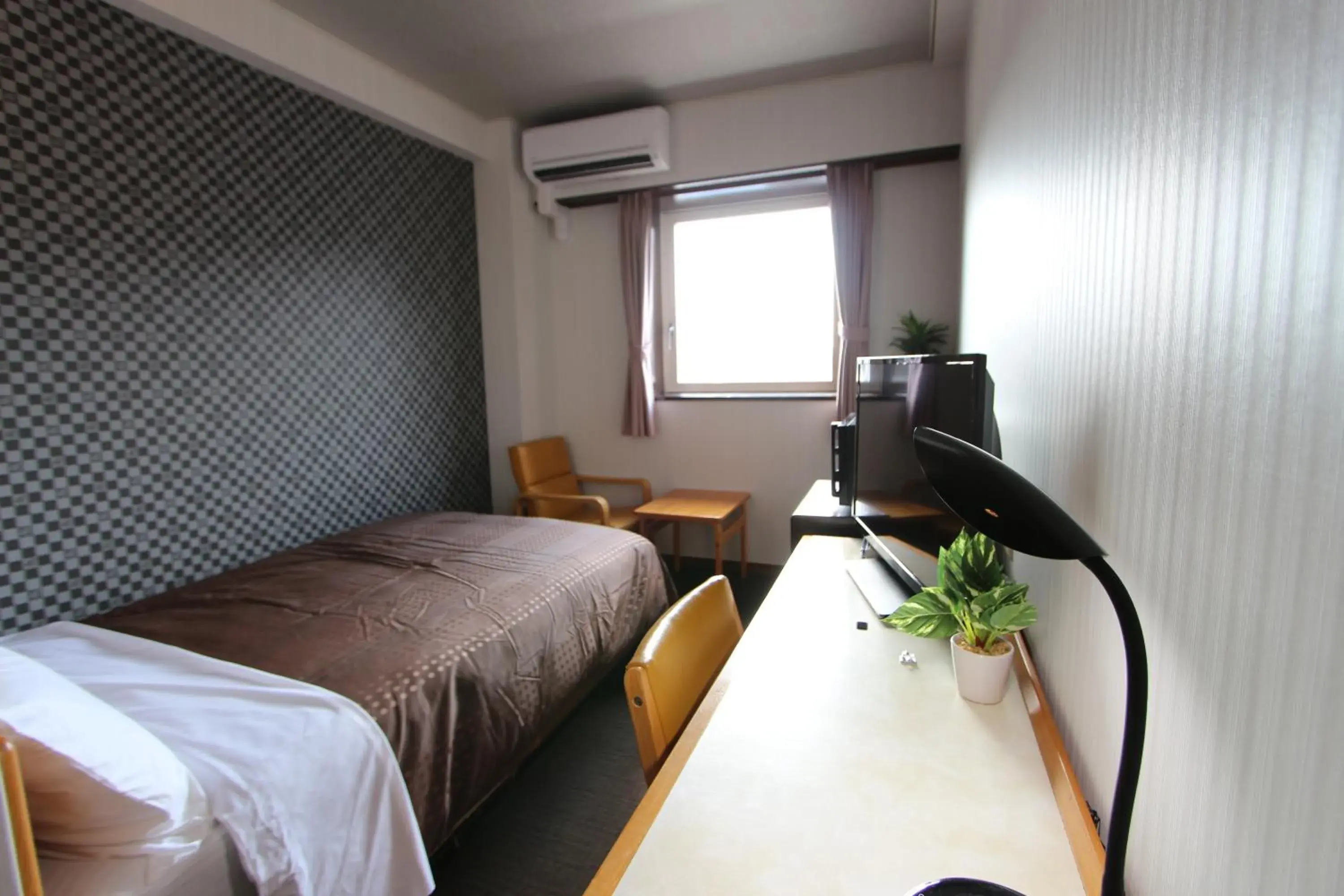 Bed in HOTEL LiVEMAX BUDGET Utsunomiya