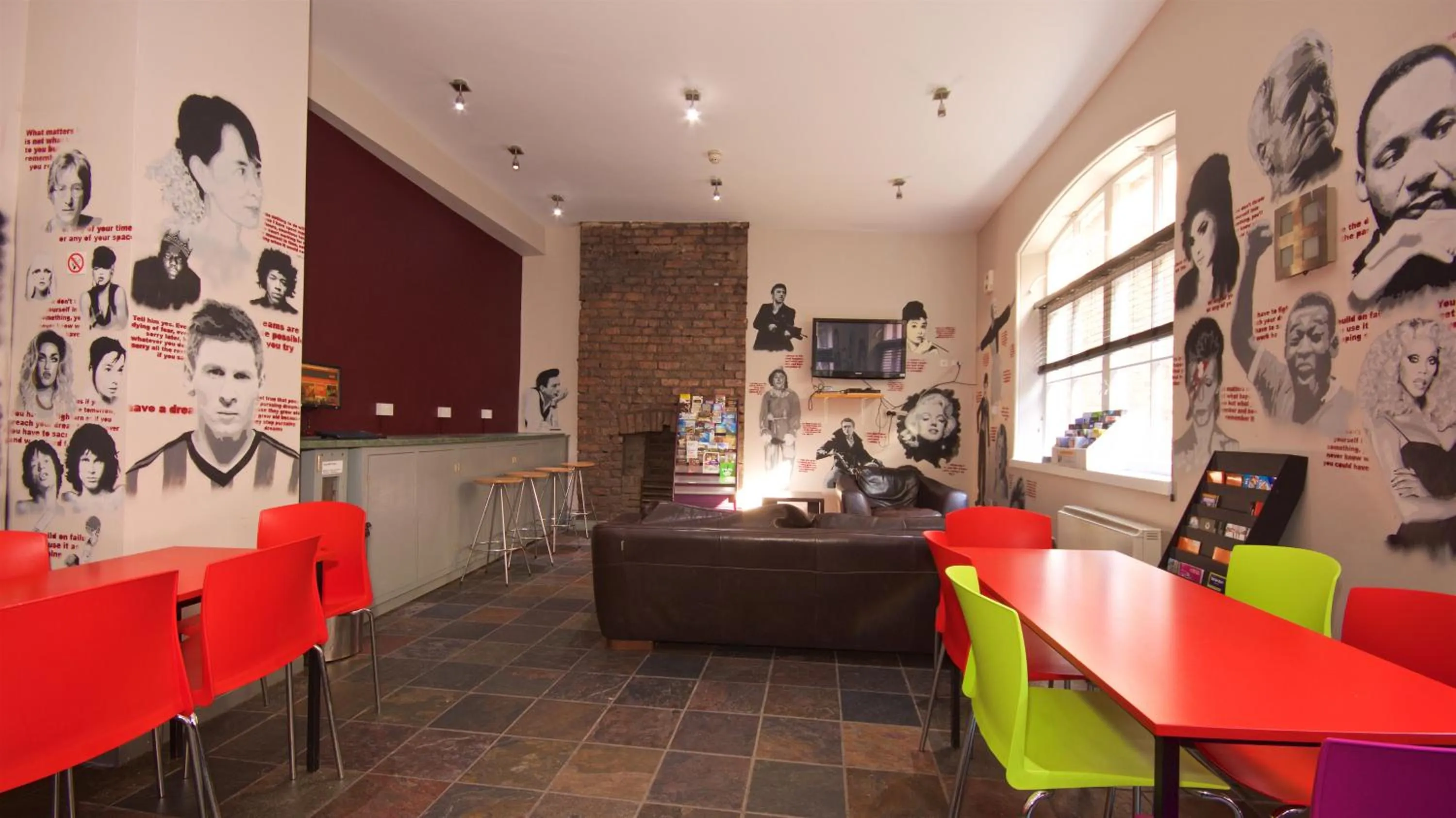 Communal lounge/ TV room in Albatross Hostel