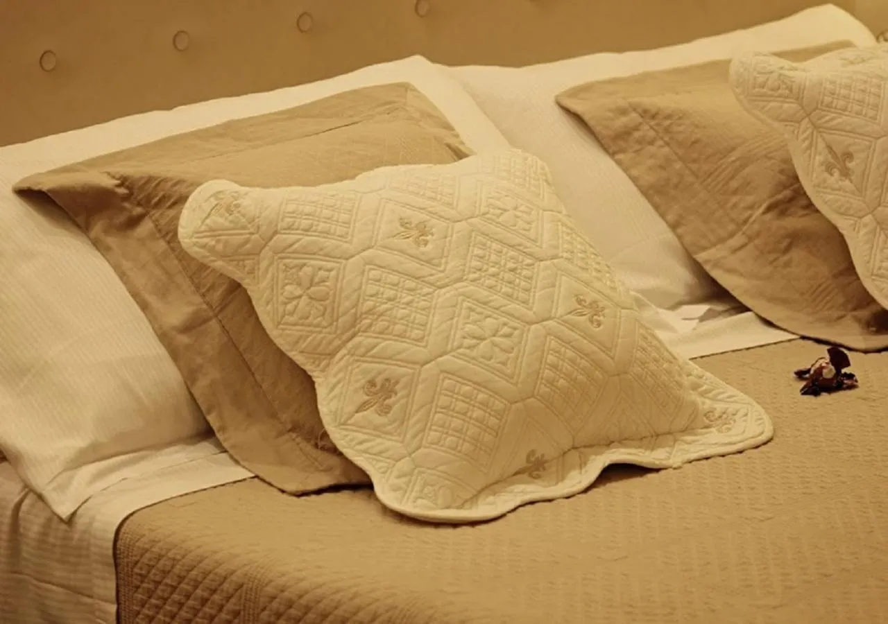 Decorative detail, Bed in Locanda Navona