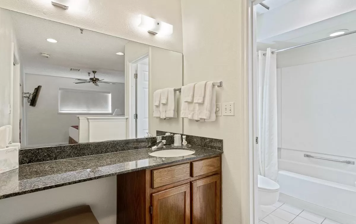 Bathroom in Chase Suite Hotel Rocky Point Tampa