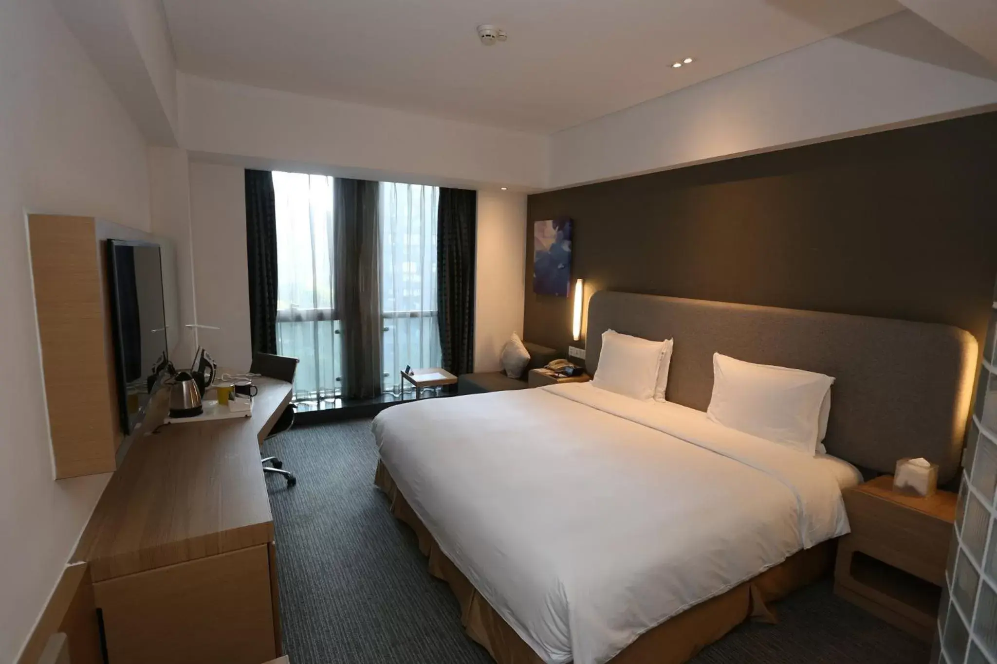 Photo of the whole room in Holiday Inn Express Shanghai Jinsha, an IHG Hotel