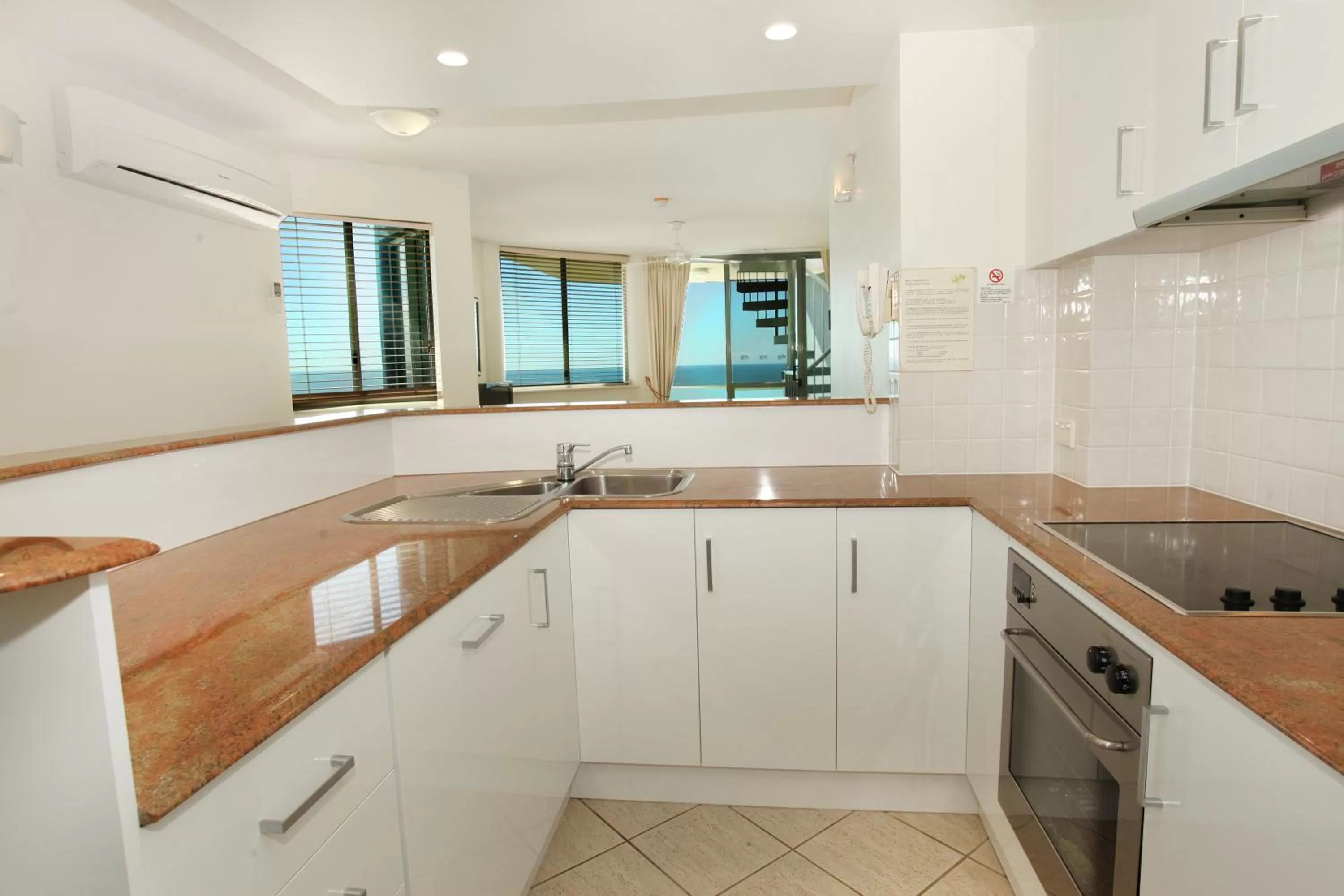 Kitchen or kitchenette in Malibu Apartments