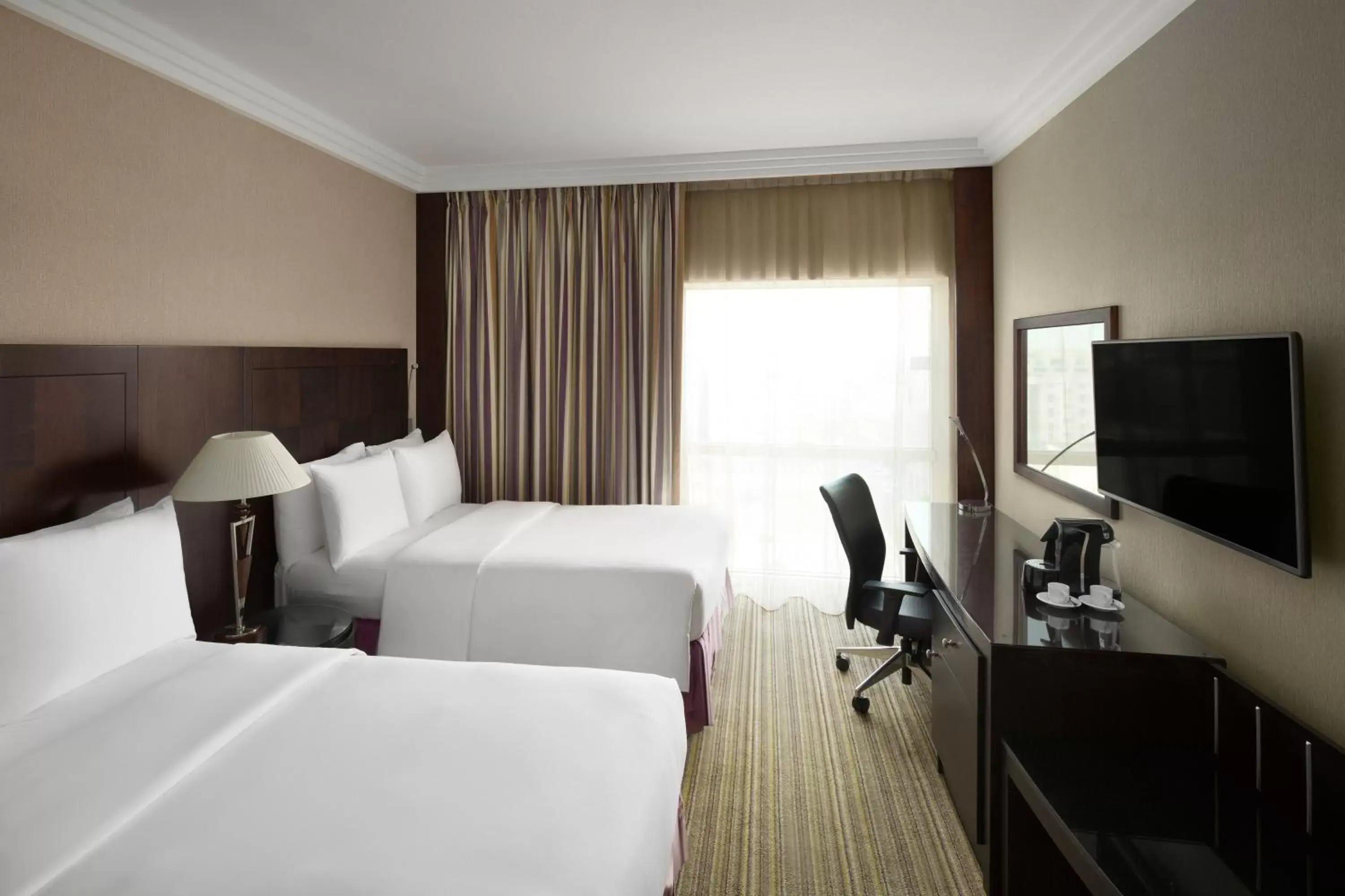 Photo of the whole room, Bed in Crowne Plaza Jeddah, an IHG Hotel