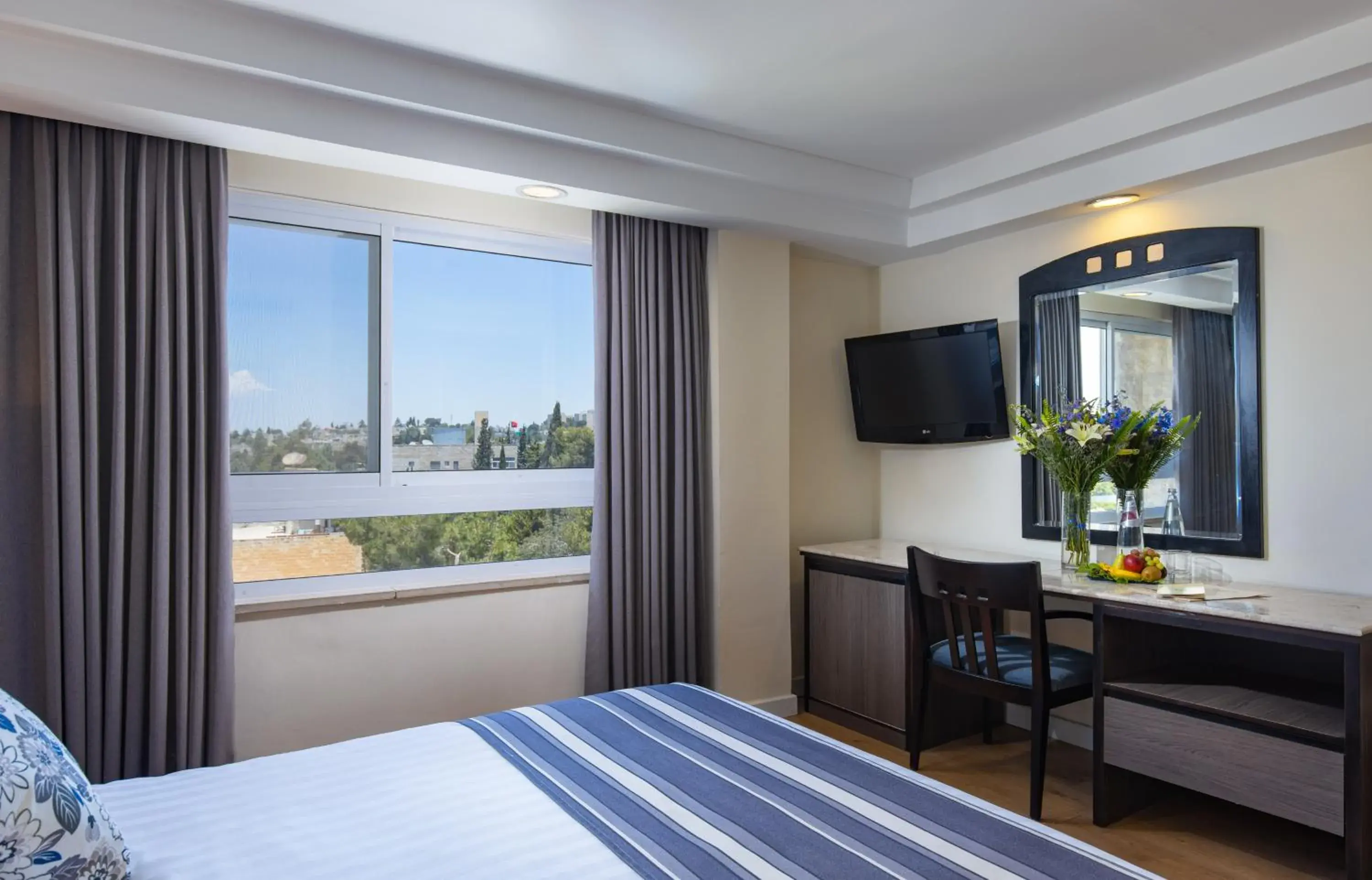 Bedroom in Ambassador Hotel