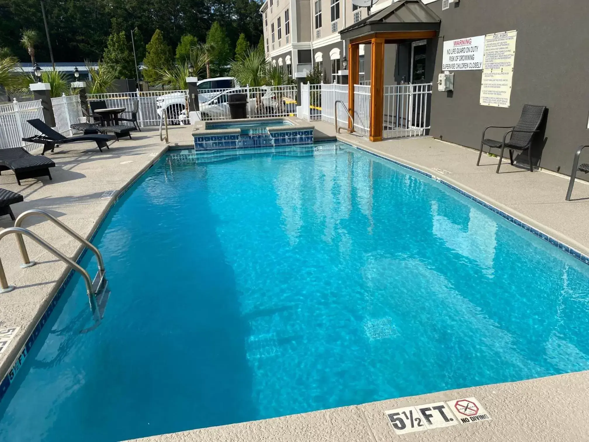 Swimming Pool in Country Inn & Suites by Radisson, Hinesville, GA