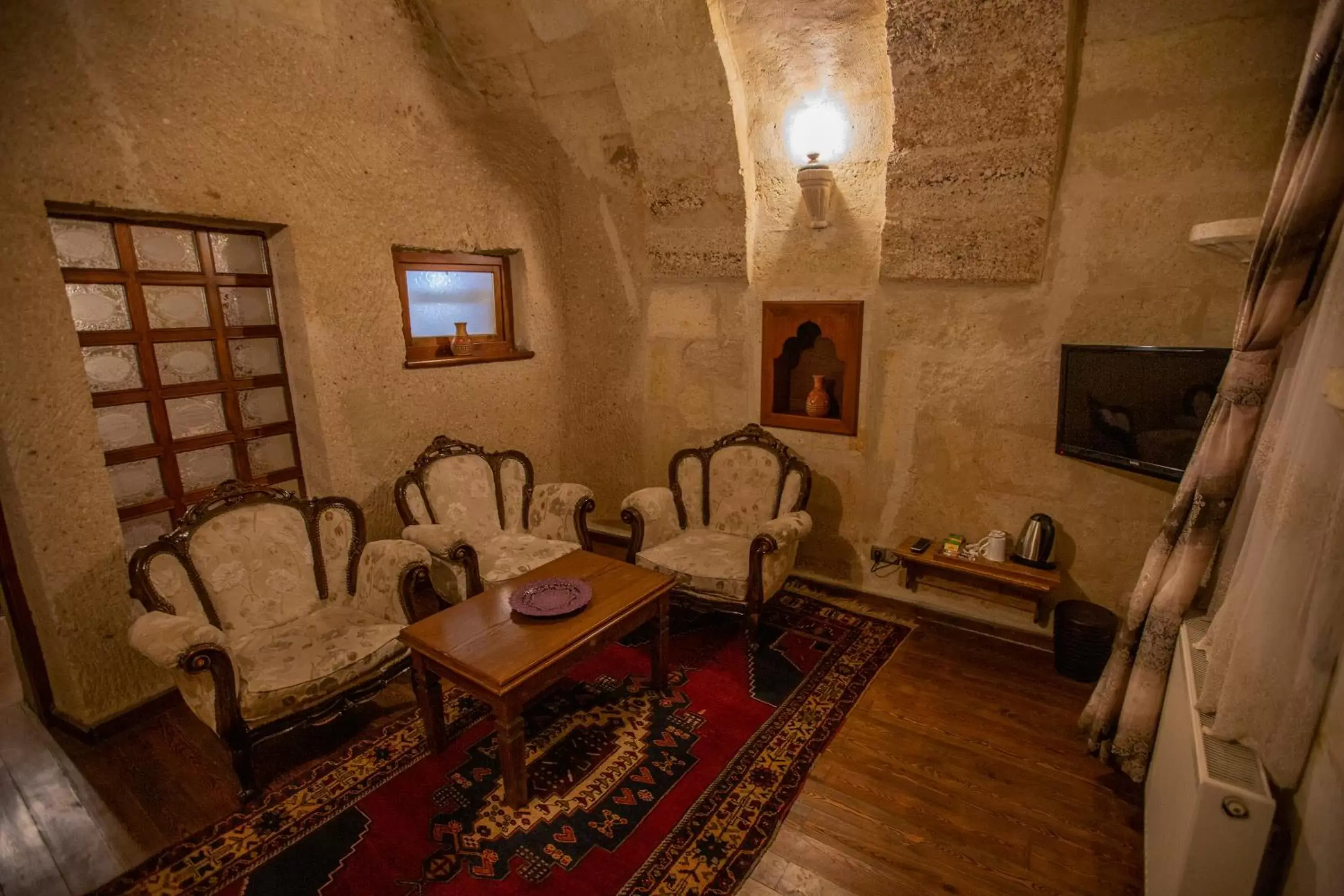 Living room in Stone House Cave Hotel