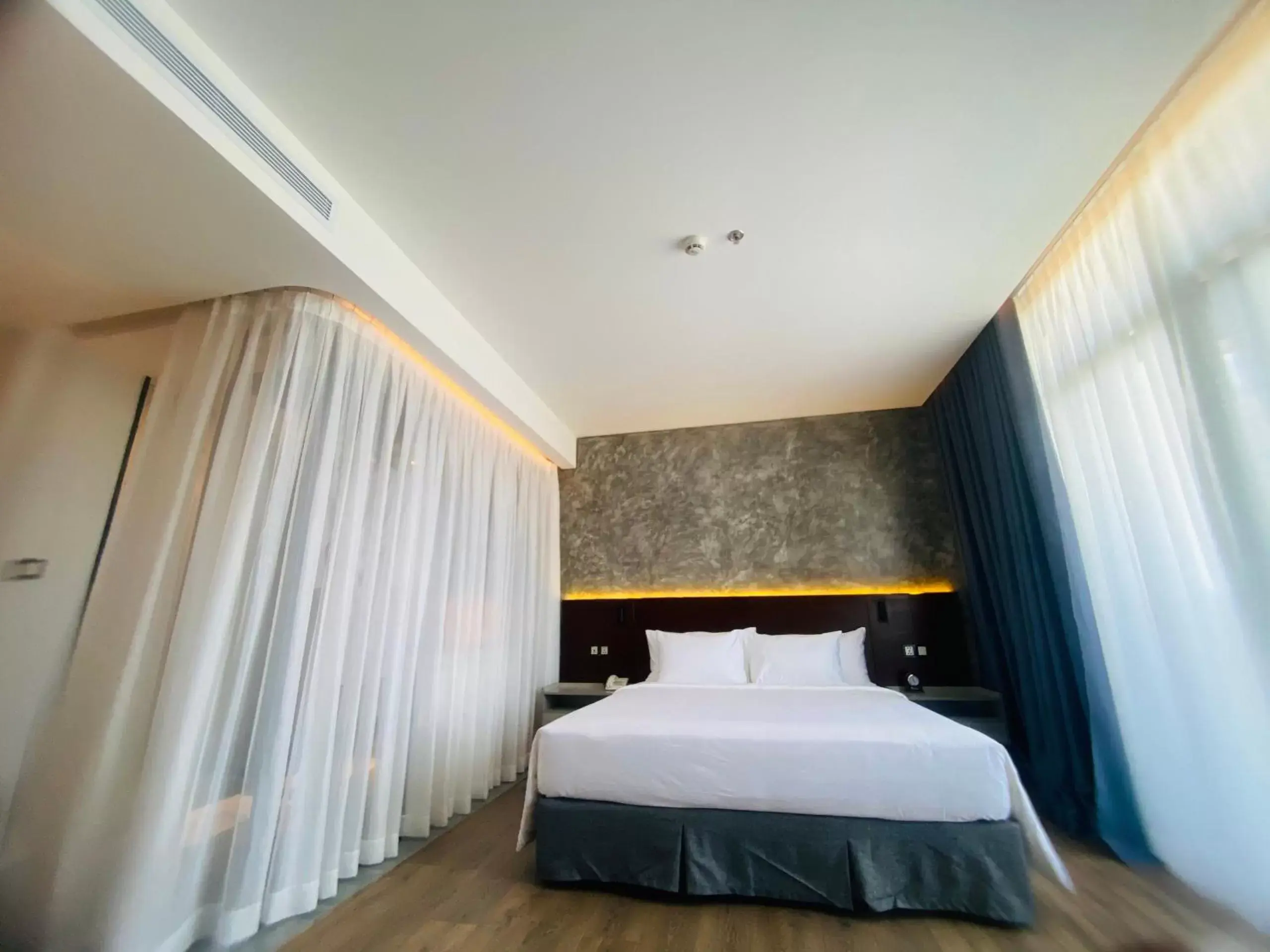 Bedroom, Bed in NEWCC HOTEL AND SERVICED APARTMENT Bedroom, Bed in NEWCC HOTEL AND SERVICED APARTMENT