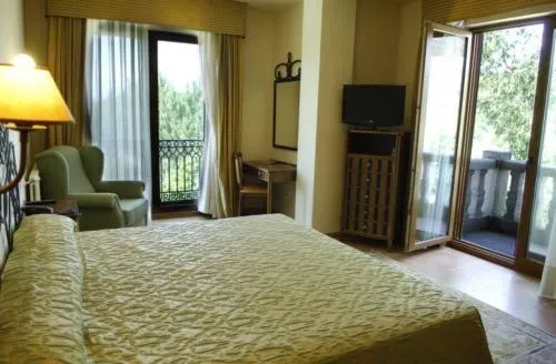 View (from property/room), Bed in Hotel Abeiras