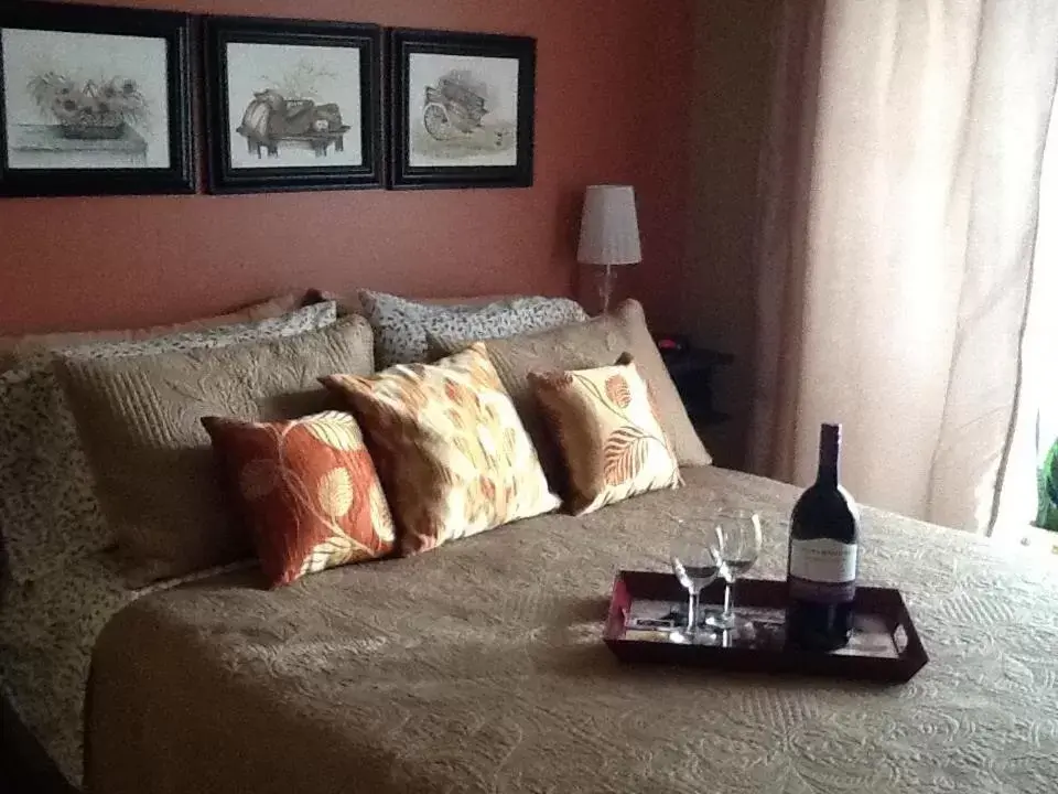 Bed in Vintage Merlot Bed and Breakfast