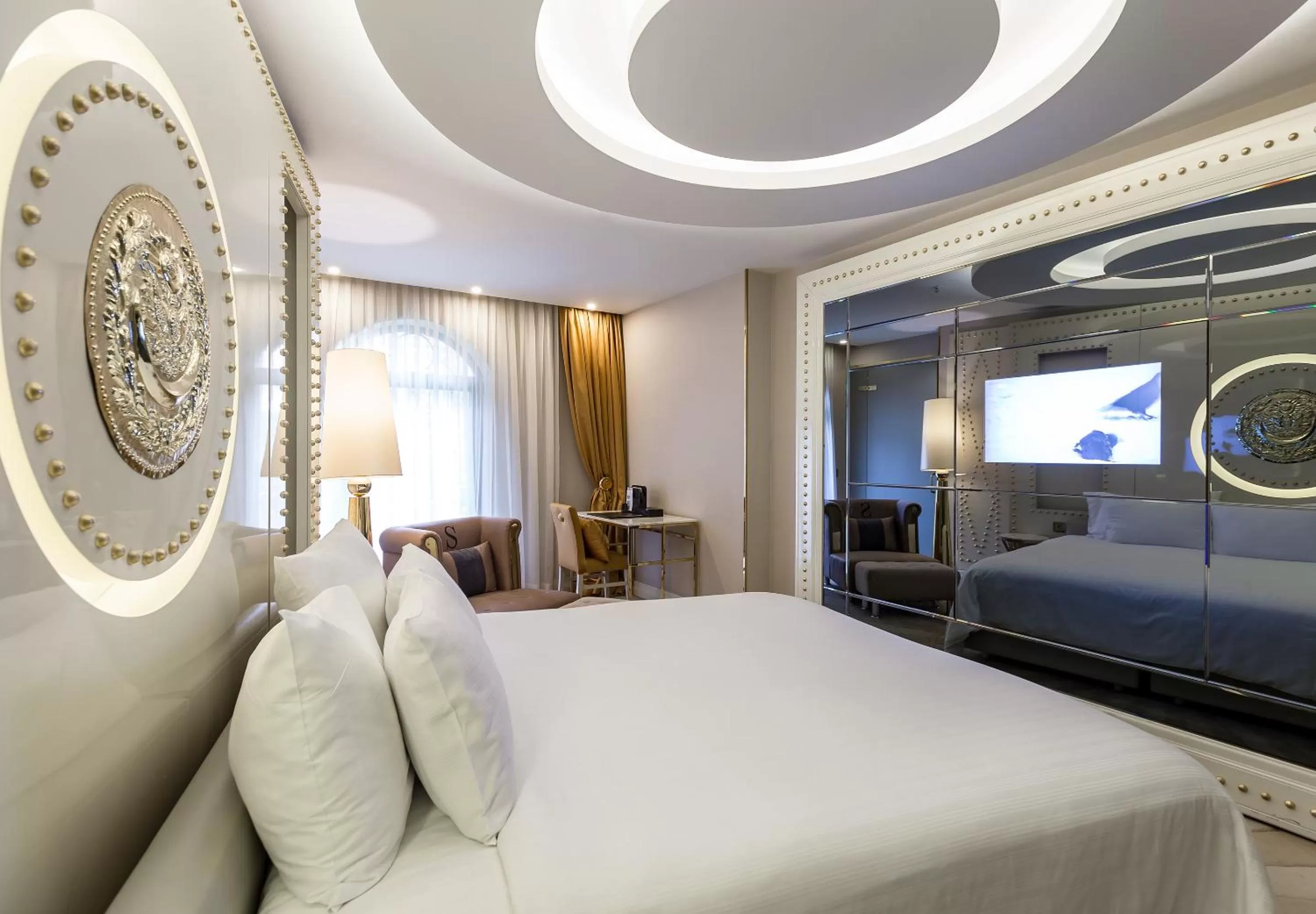 Bed in Sura Design Hotel & Suites