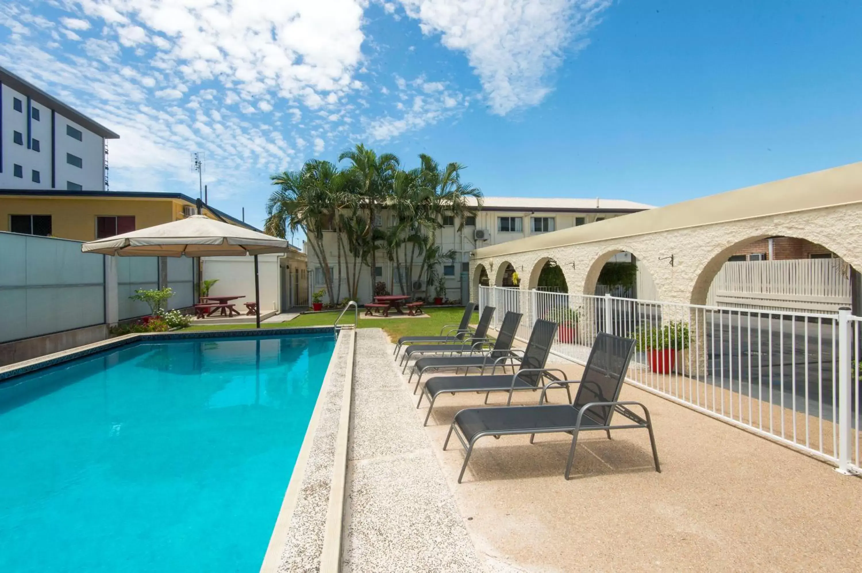 Pool view, Property Building in Coral Sands Motel