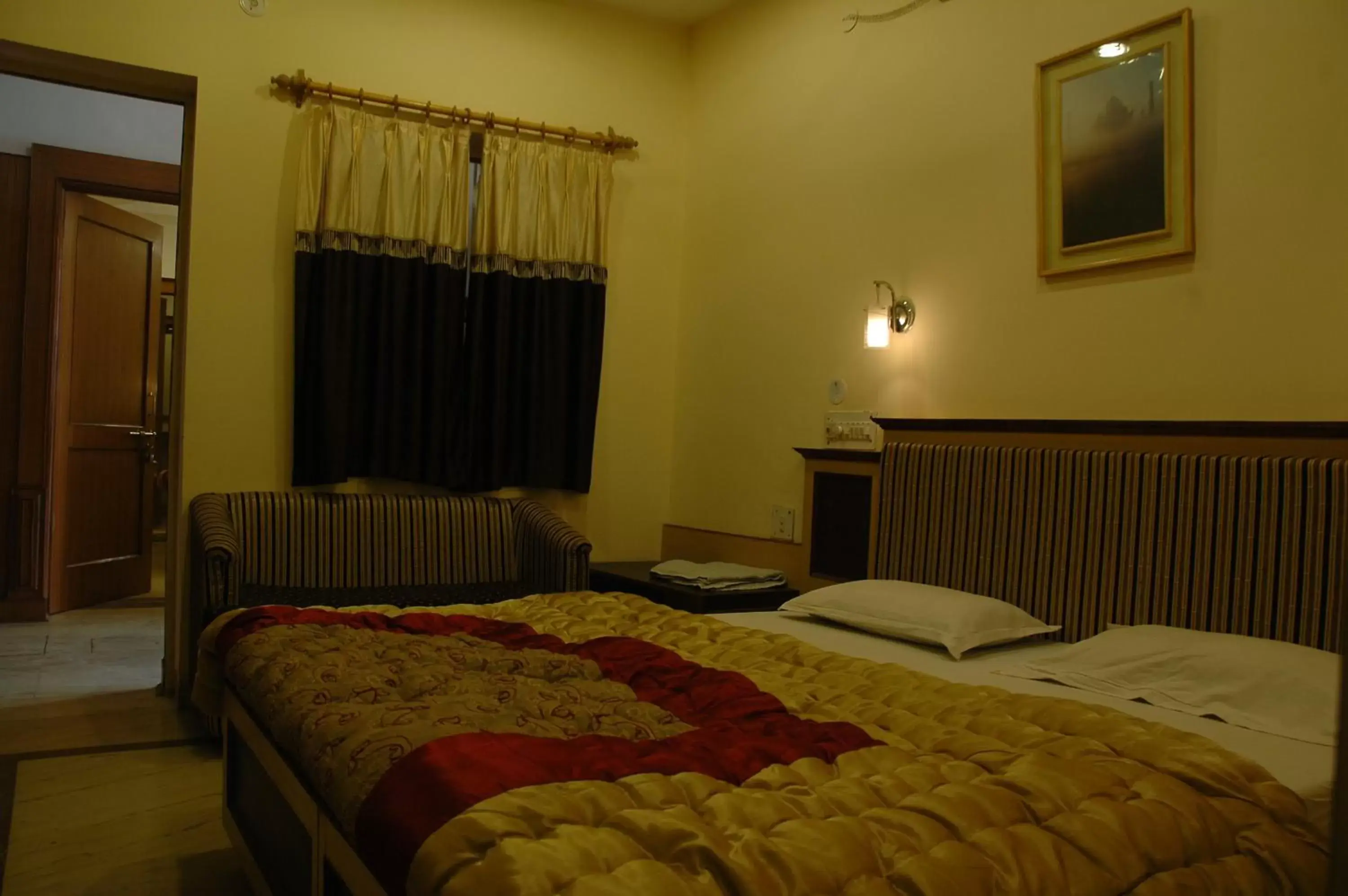 Photo of the whole room, Bed in Hotel Kamal Nearest To Taj Mahal