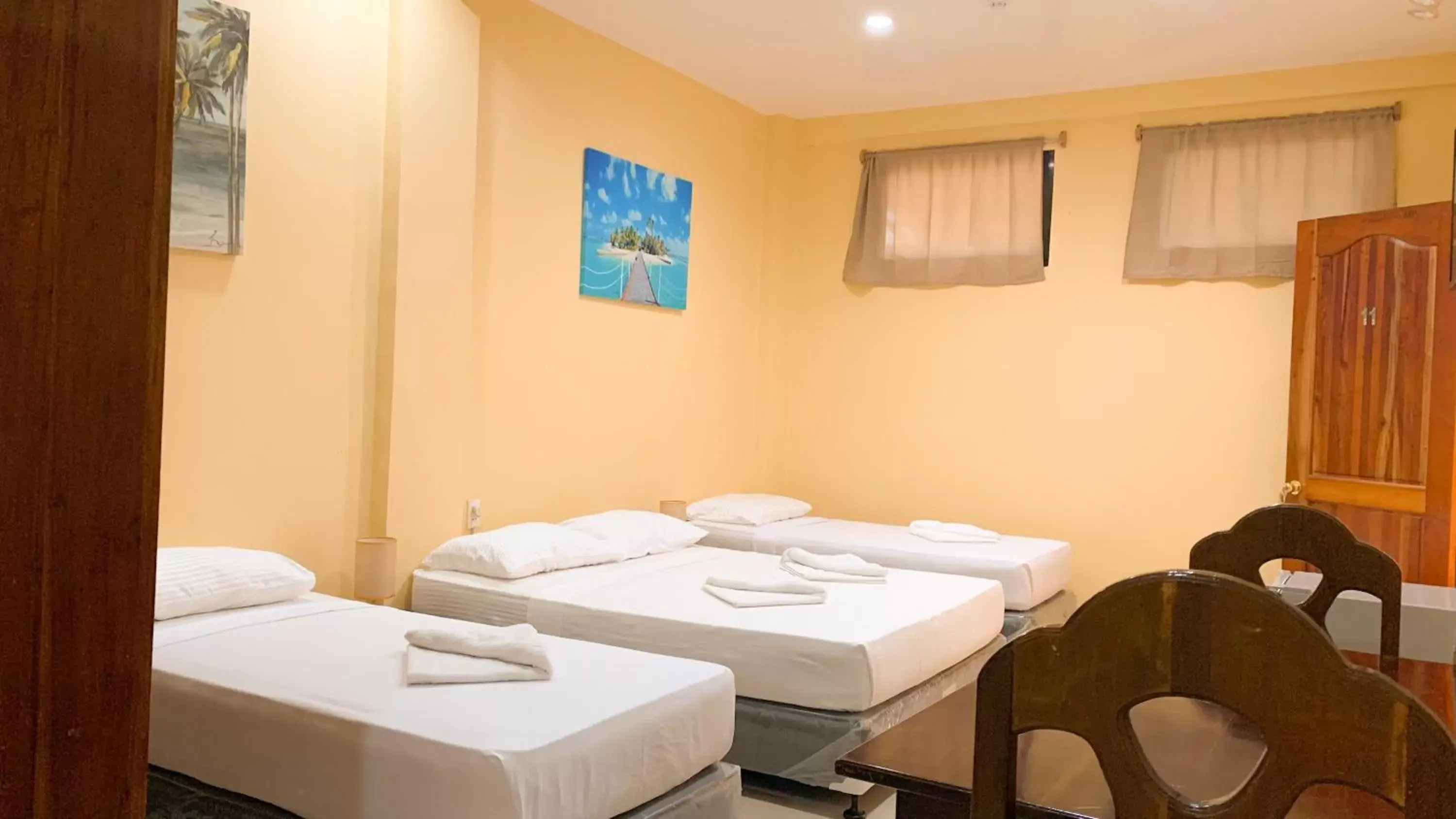 Bed in Mabini Hotel Bed in Mabini Hotel