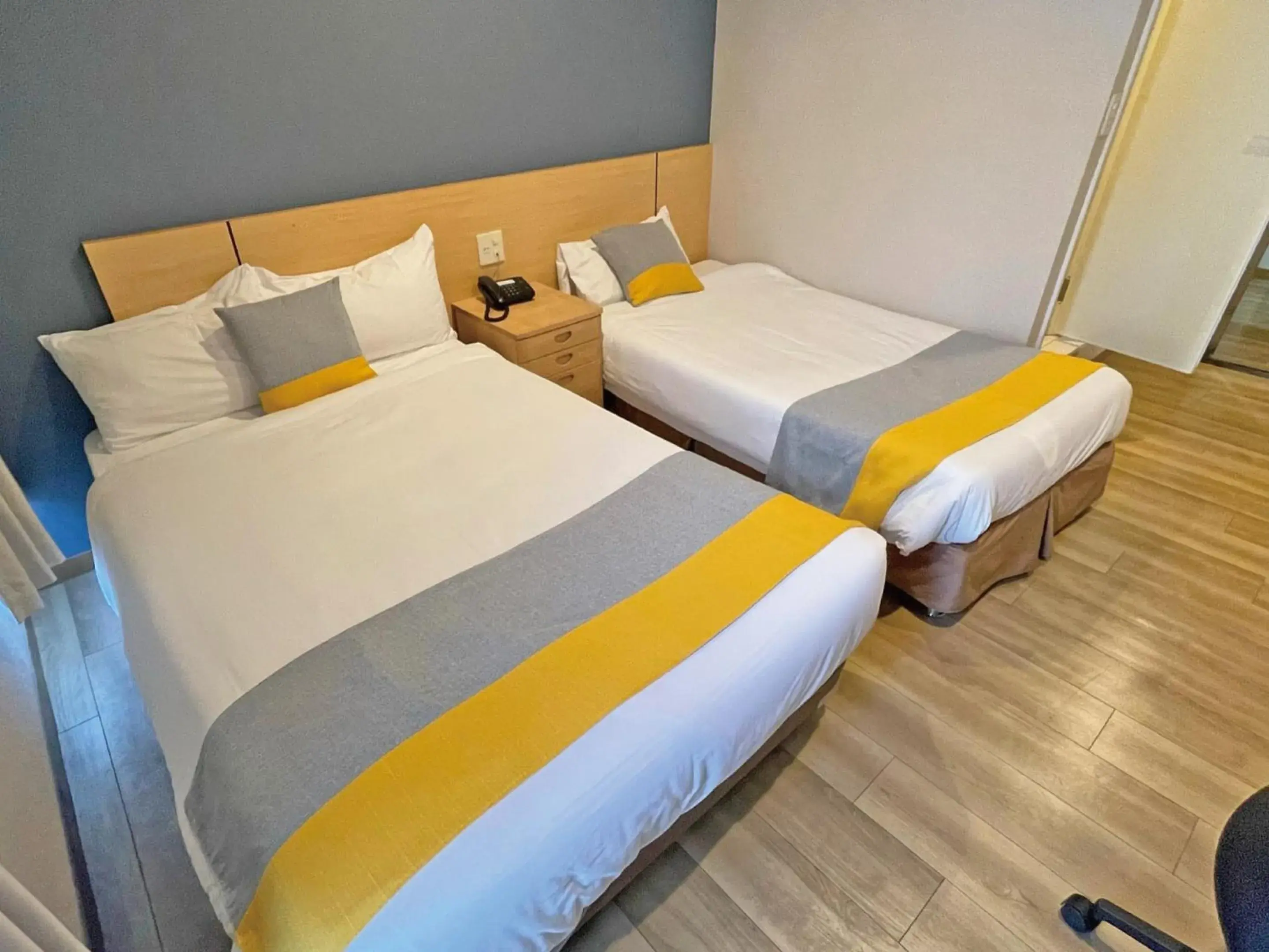 Bed in Victoria Hotel Naha