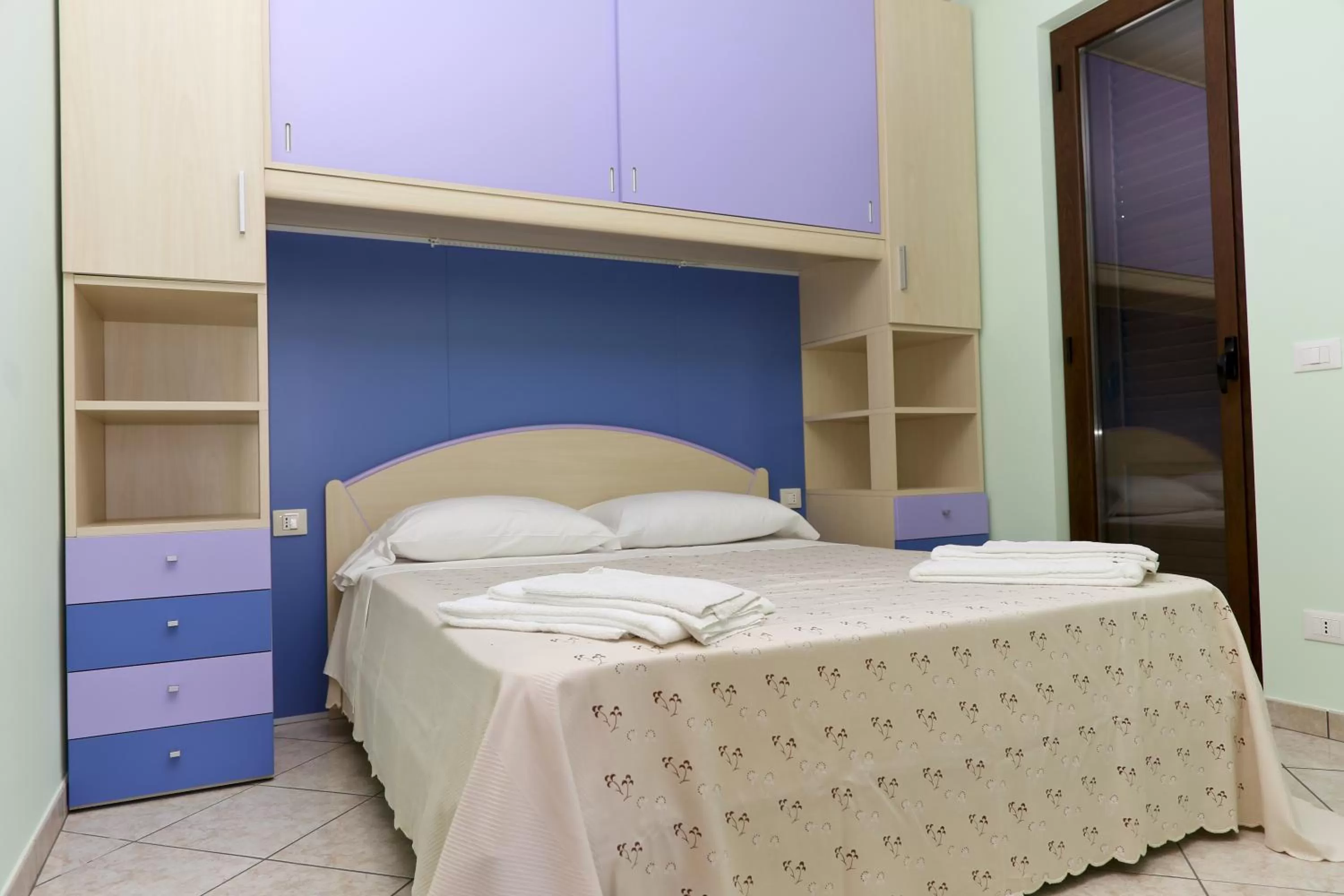 Bed in Appartamenti Anzà