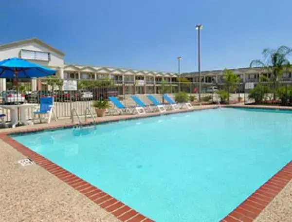 Swimming Pool in Super 8 by Wyndham Breaux Bridge