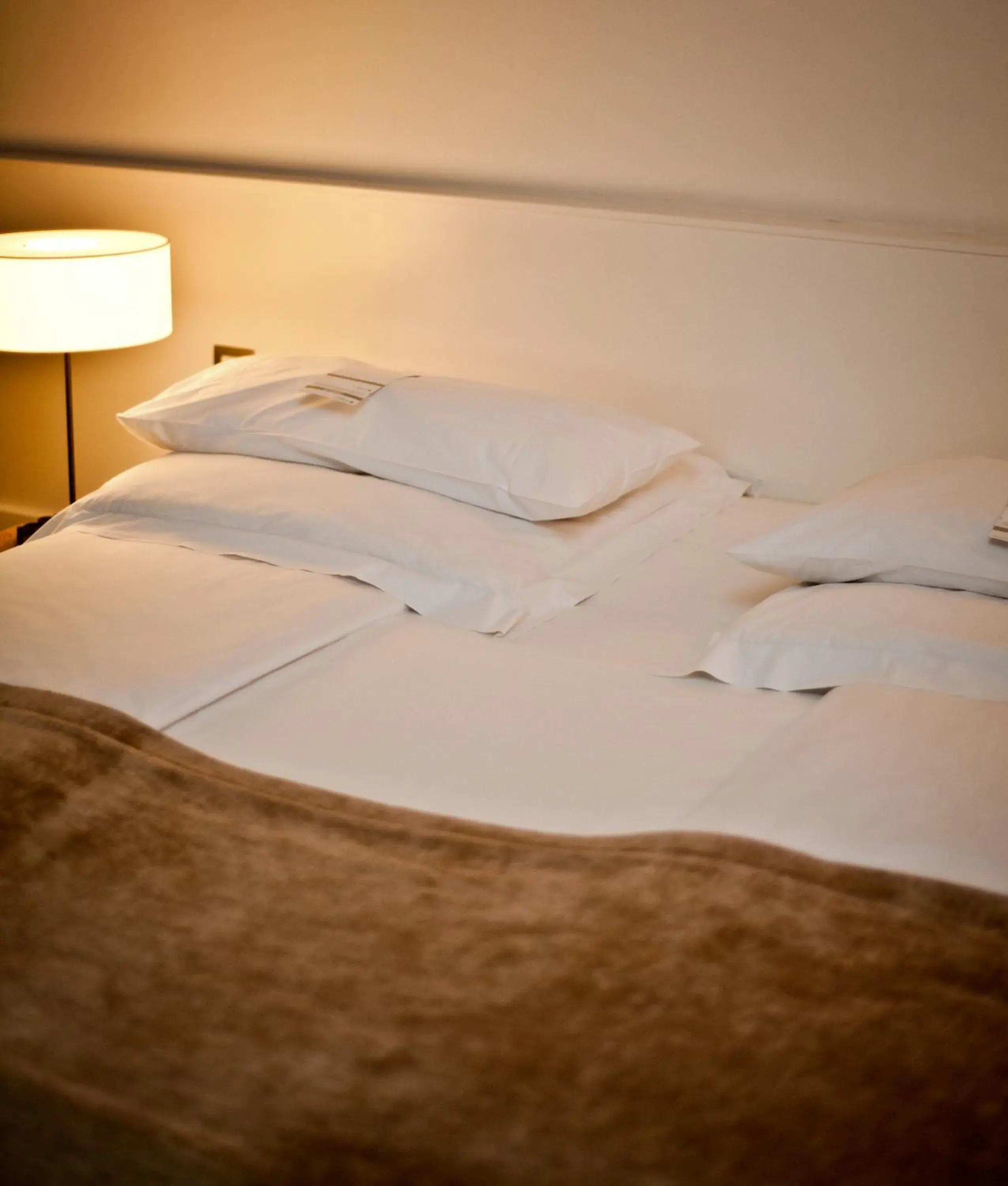 Bed in CORTIINA Hotel