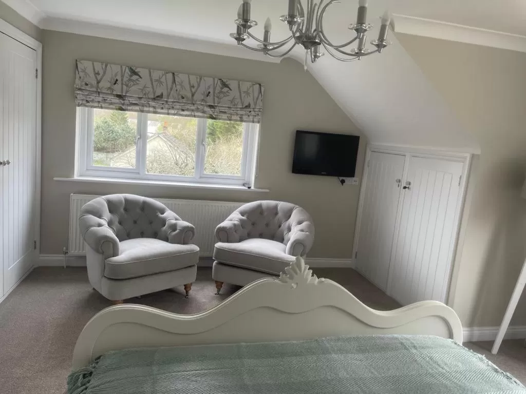 Property building, Seating Area in Woodland House B & B