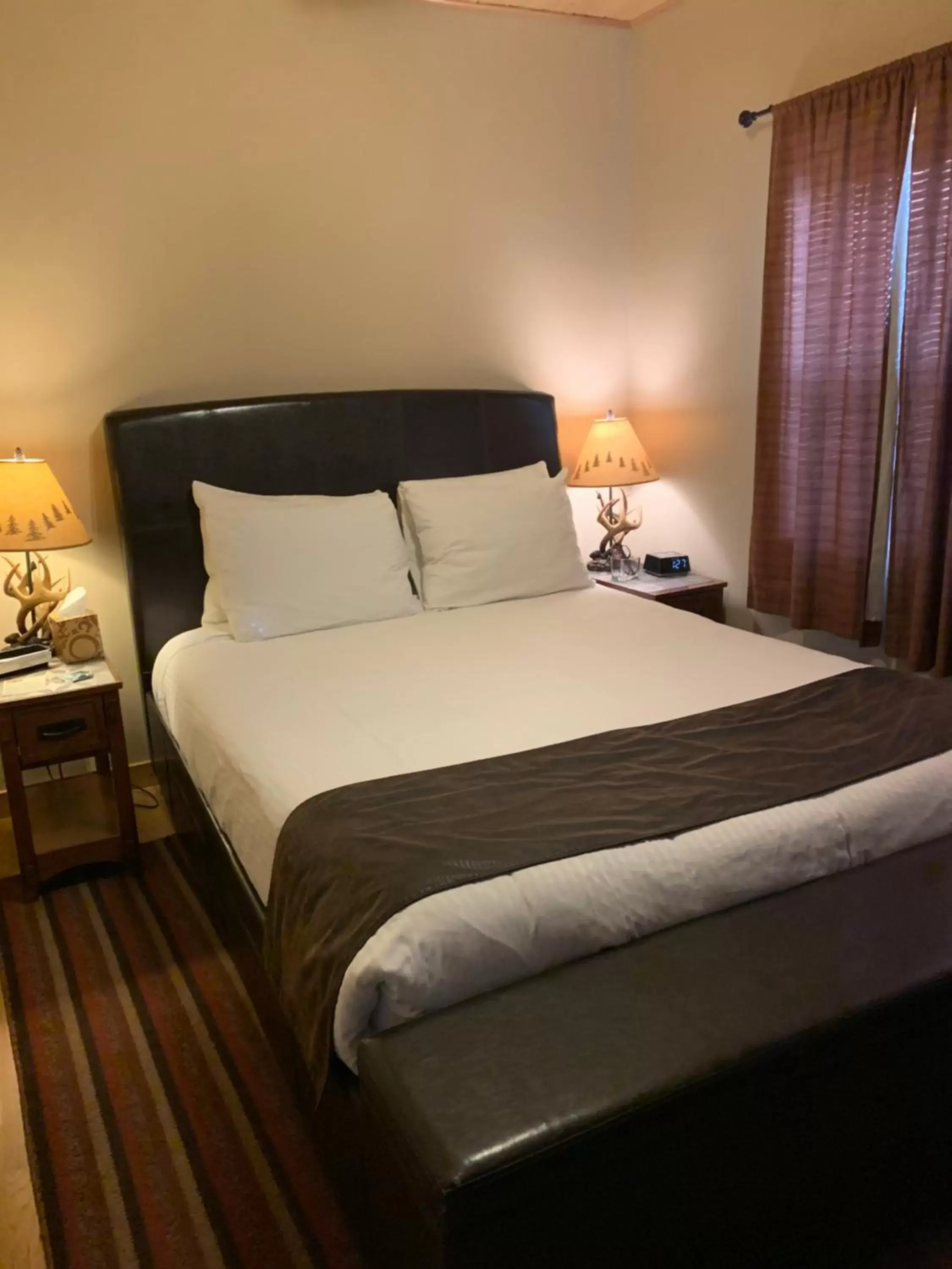 Bed in Twisp River Suites