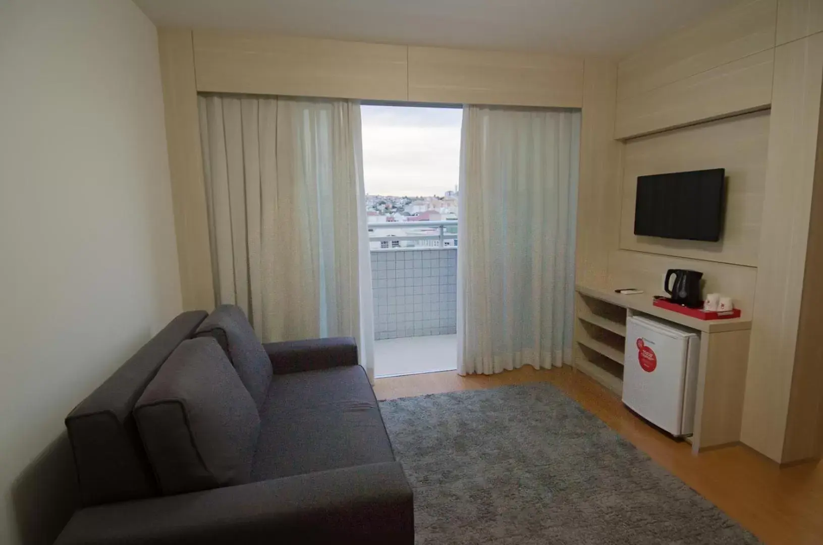 TV and multimedia, Seating Area in Ramada Encore by Wyndham Belo Horizonte Minascasa