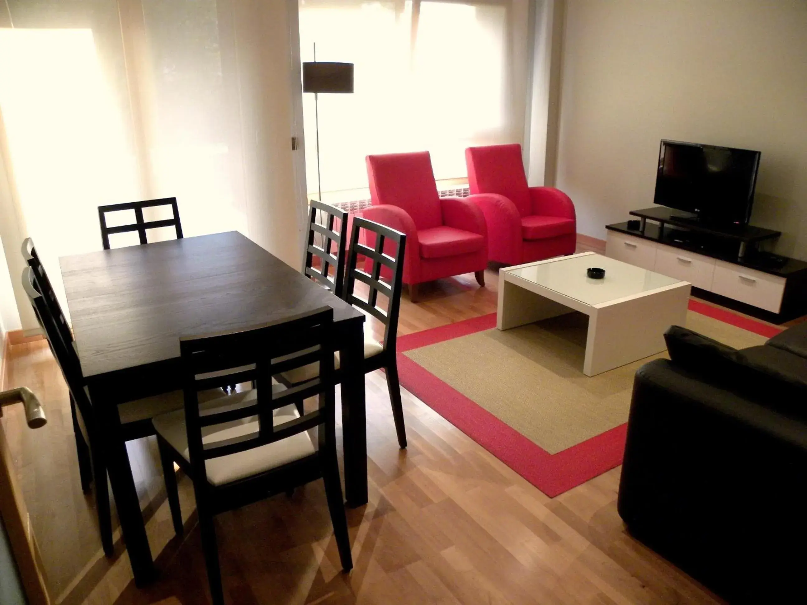 Living room, Dining Area in Apartamentos Albatros