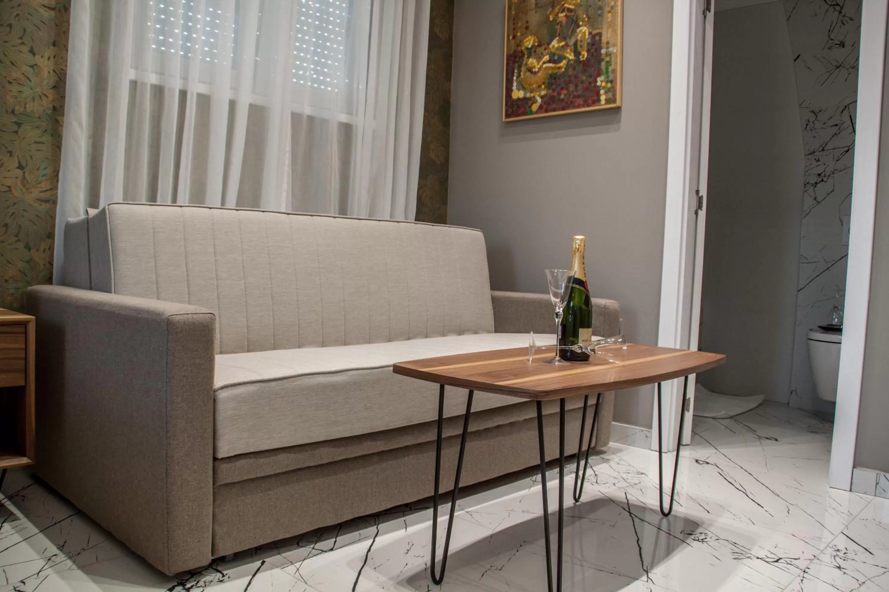 Seating area in Garni Boutique Hotel Arta