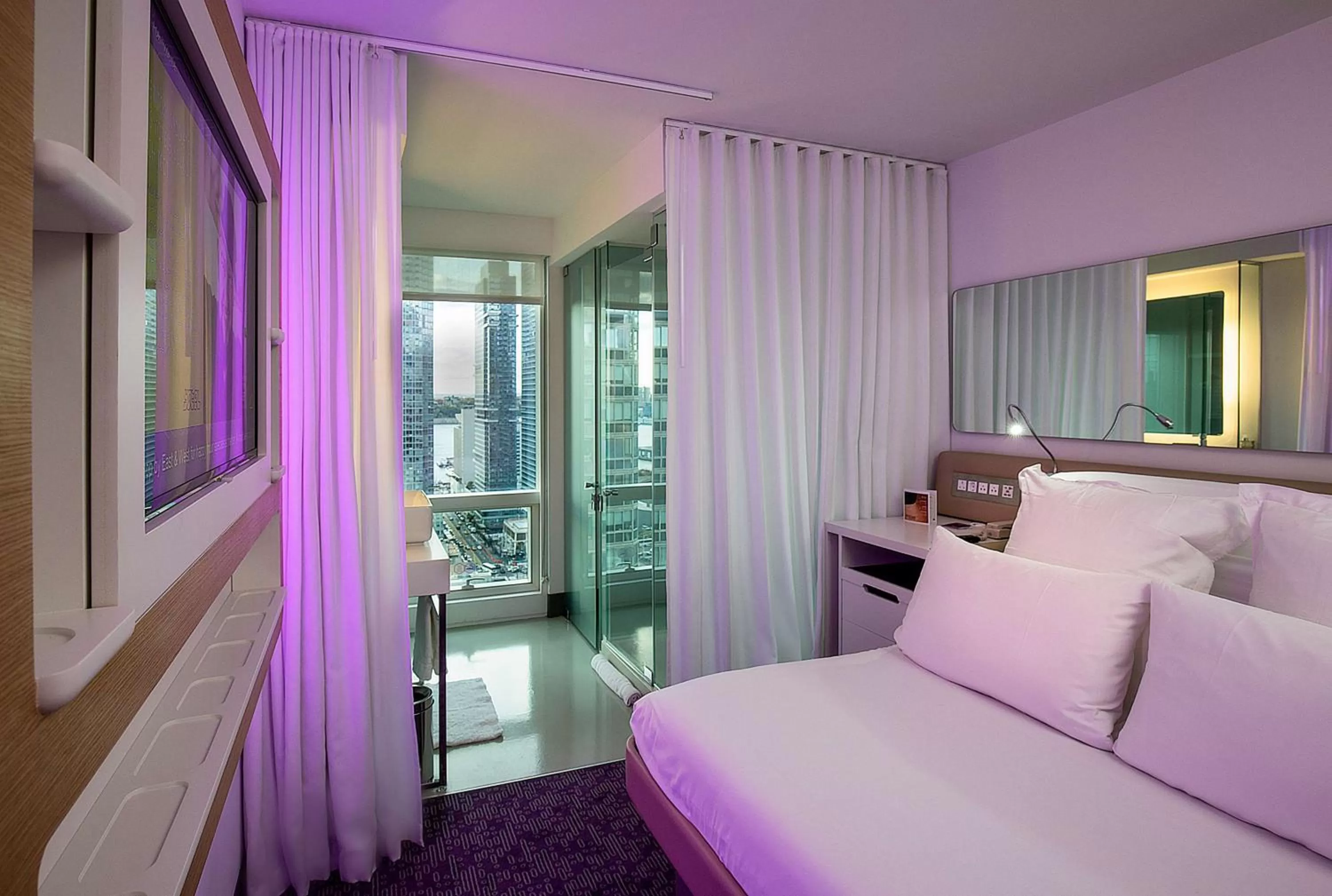 Photo of the whole room, Bed in YOTEL New York Times Square