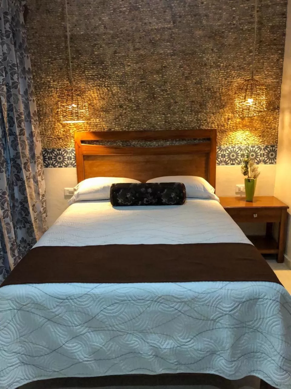 Bed in Hotel Boutique Bugambilias