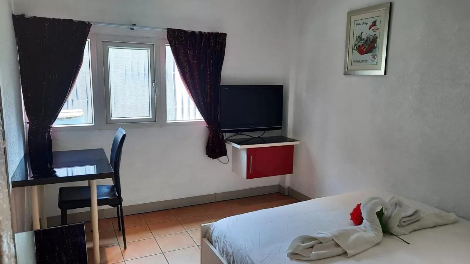 Photo of the whole room, Bed in Swiss Food Restaurant and room for rent