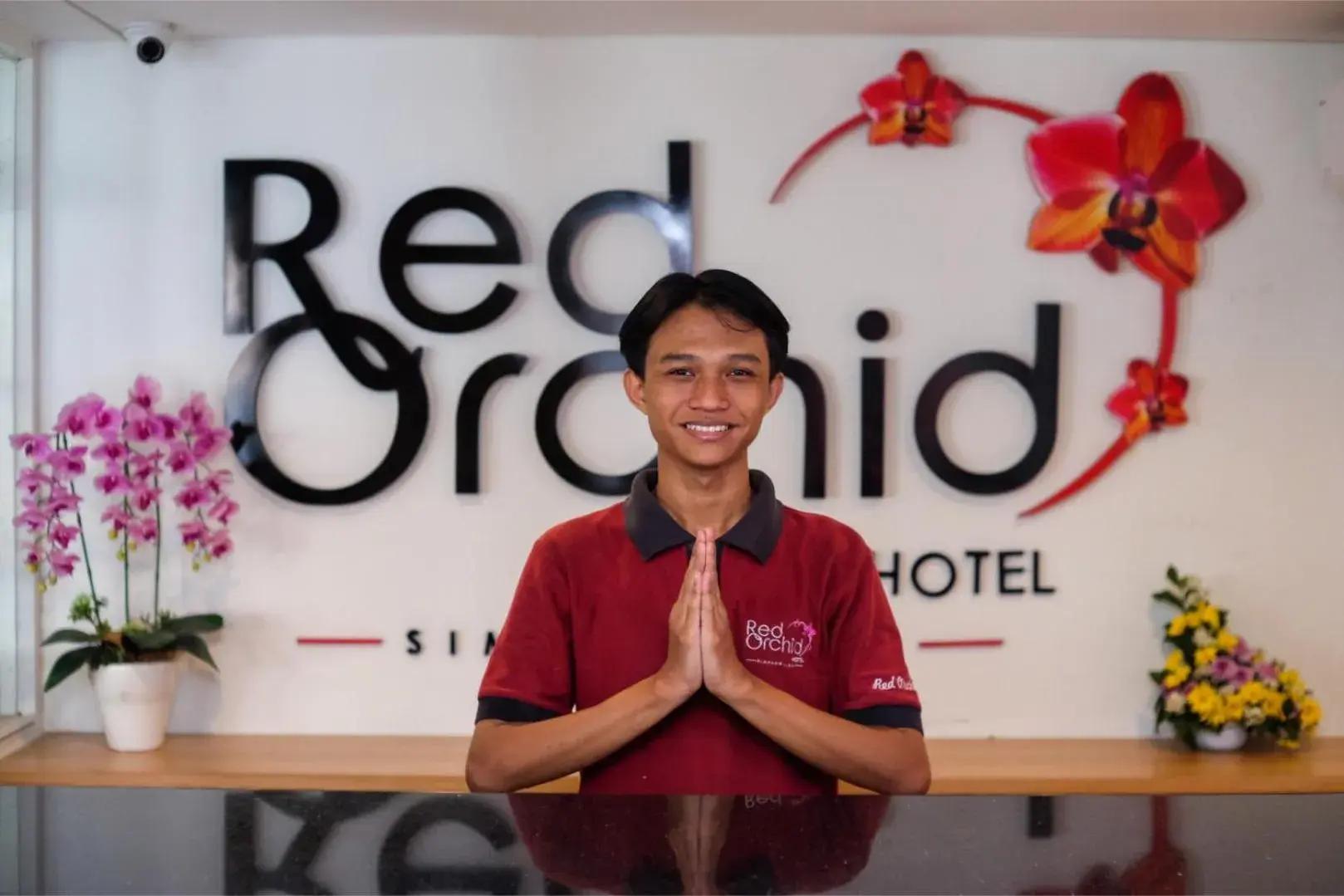 Lobby or reception, Staff in Red Orchid Hotel
