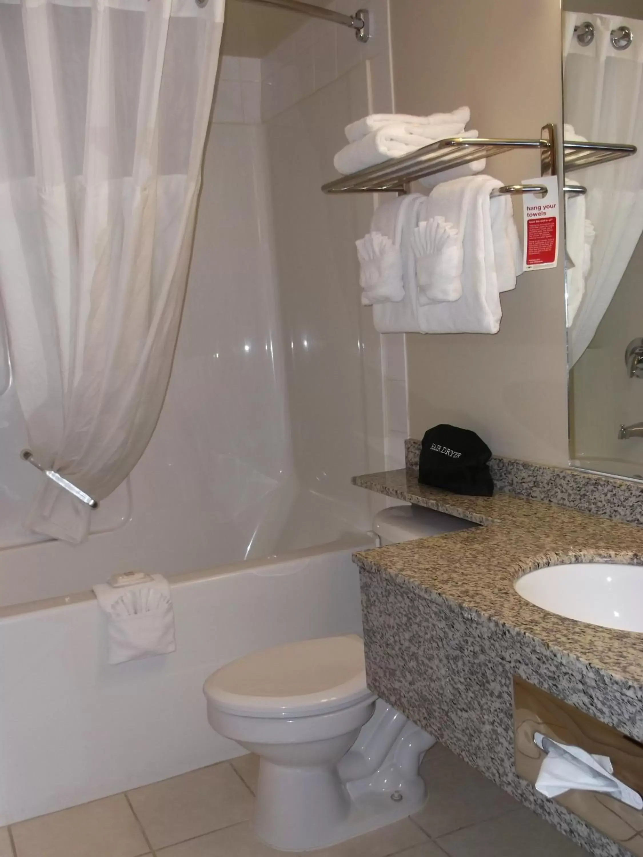 Bathroom in Ramada by Wyndham Edson