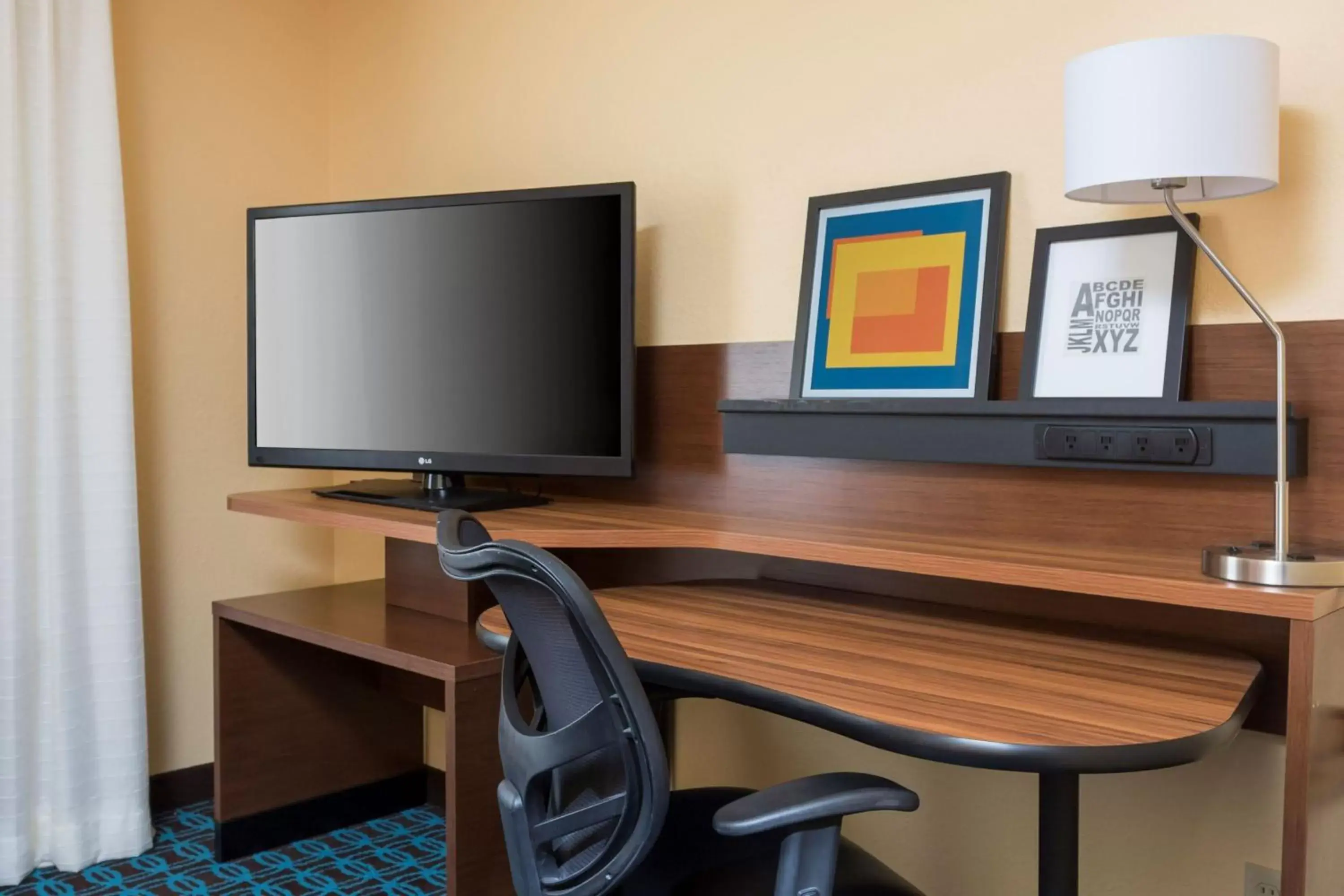 Photo of the whole room, TV/Entertainment Center in Fairfield Inn & Suites Temple Belton