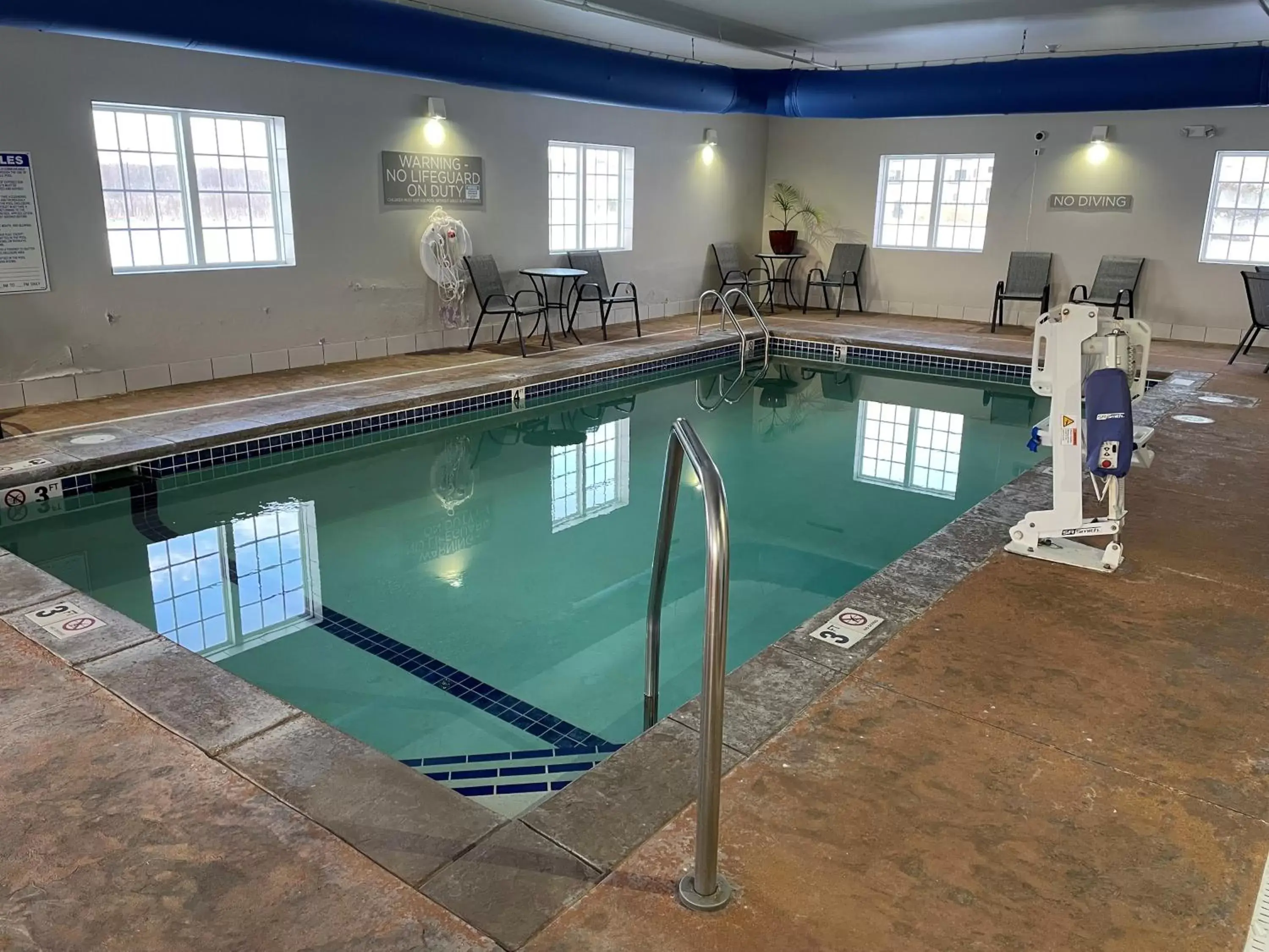 Swimming Pool in Microtel Inn & Suites by Wyndham Rochester South Mayo Clinic