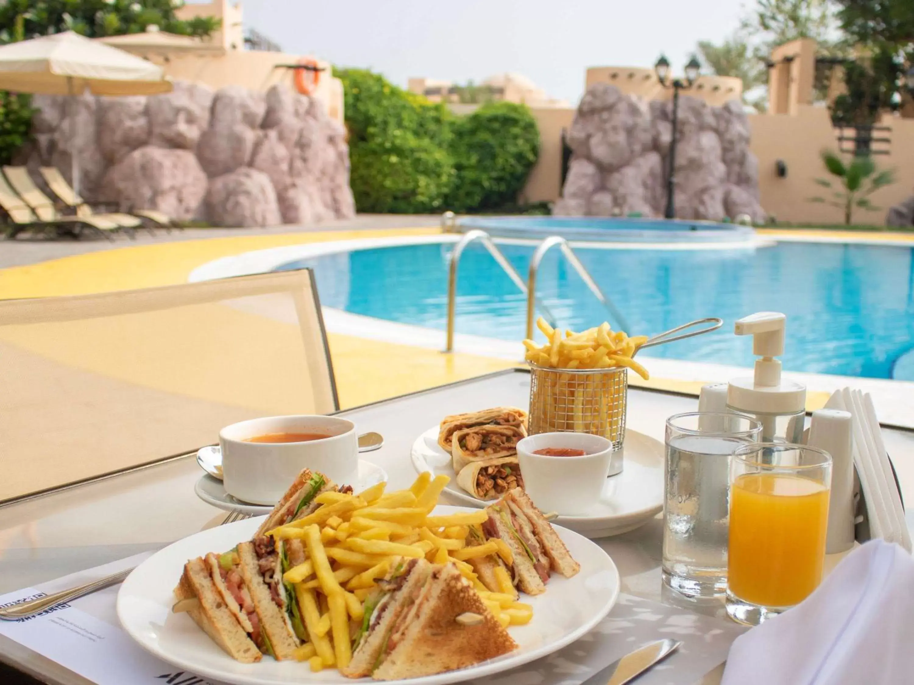 Restaurant/places to eat, Swimming Pool in Novotel Bahrain Al Dana Resort