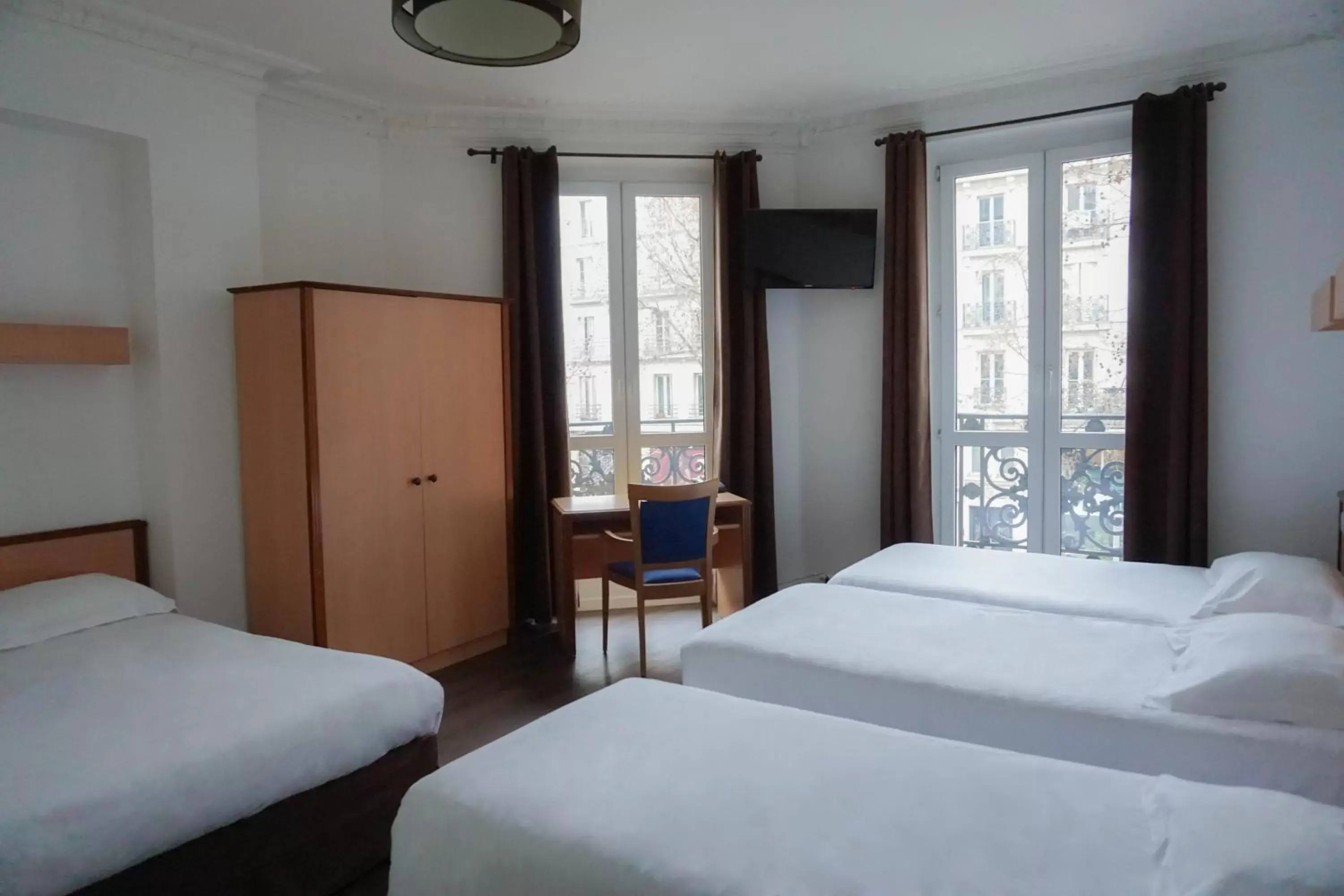 Bedroom in Hôtel Liège Strasbourg