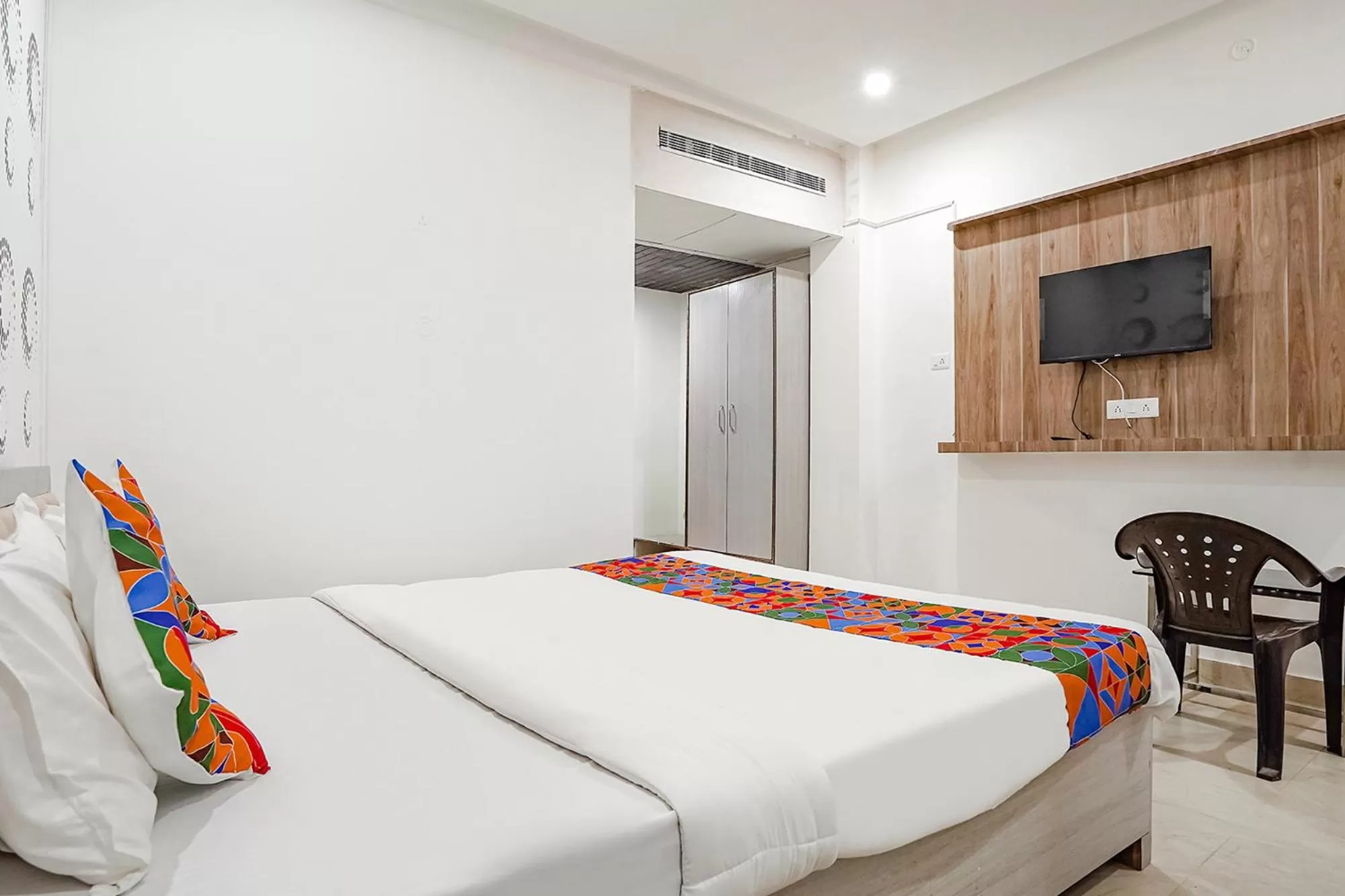 Bed in FabHotel Siddhi