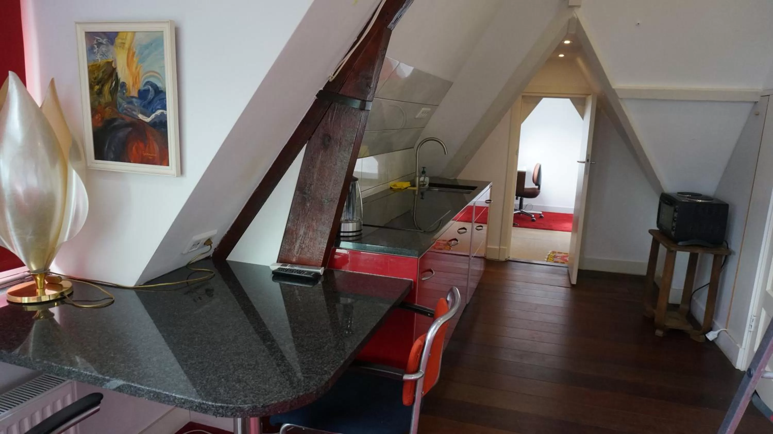 Seating area, Kitchen/Kitchenette in Xaviera's Bed and Breakfast