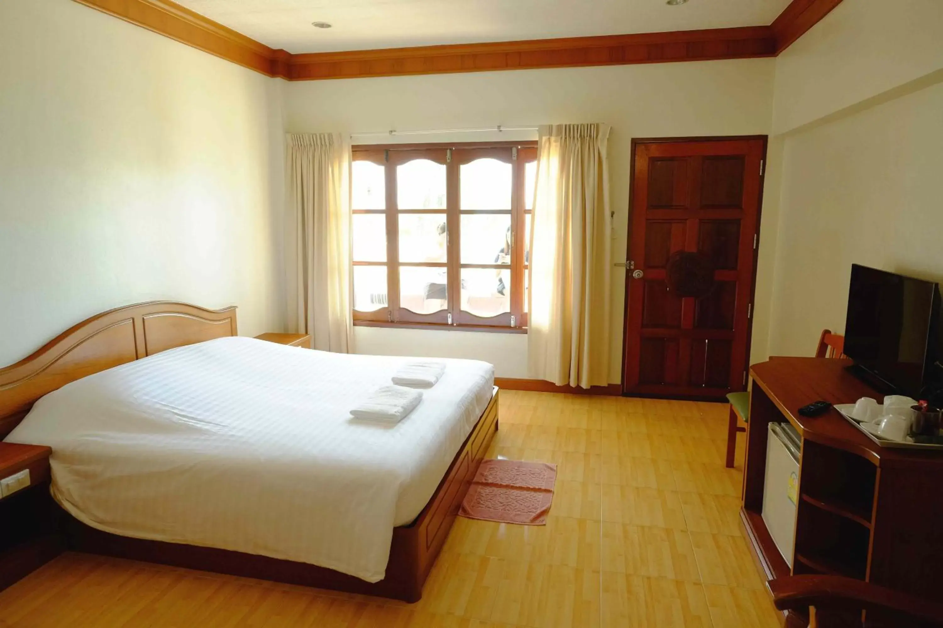 Bed in Ban Saithong Beach Resort