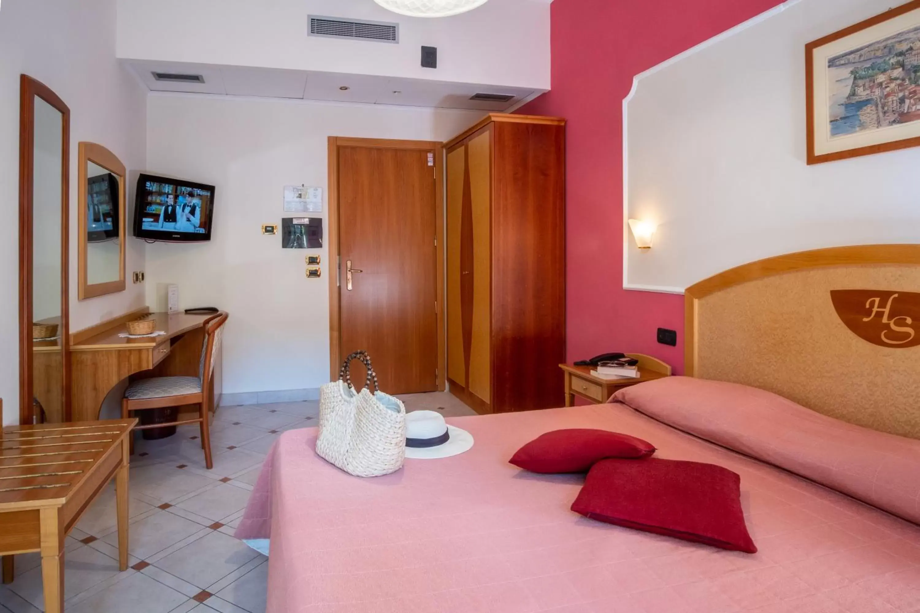 Bed in Hotel Savoia Sorrento