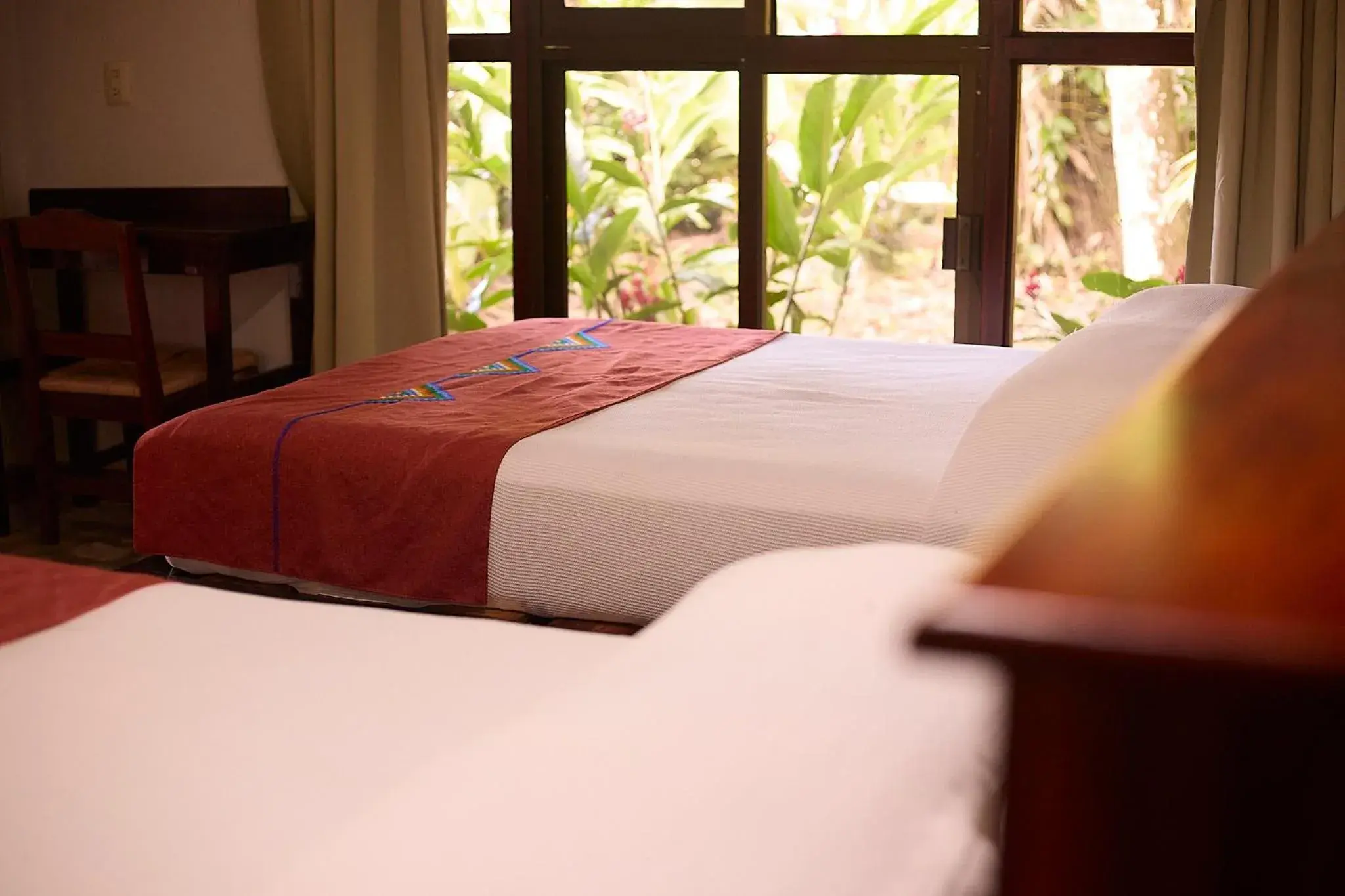 Bed in Chan-Kah Resort Village