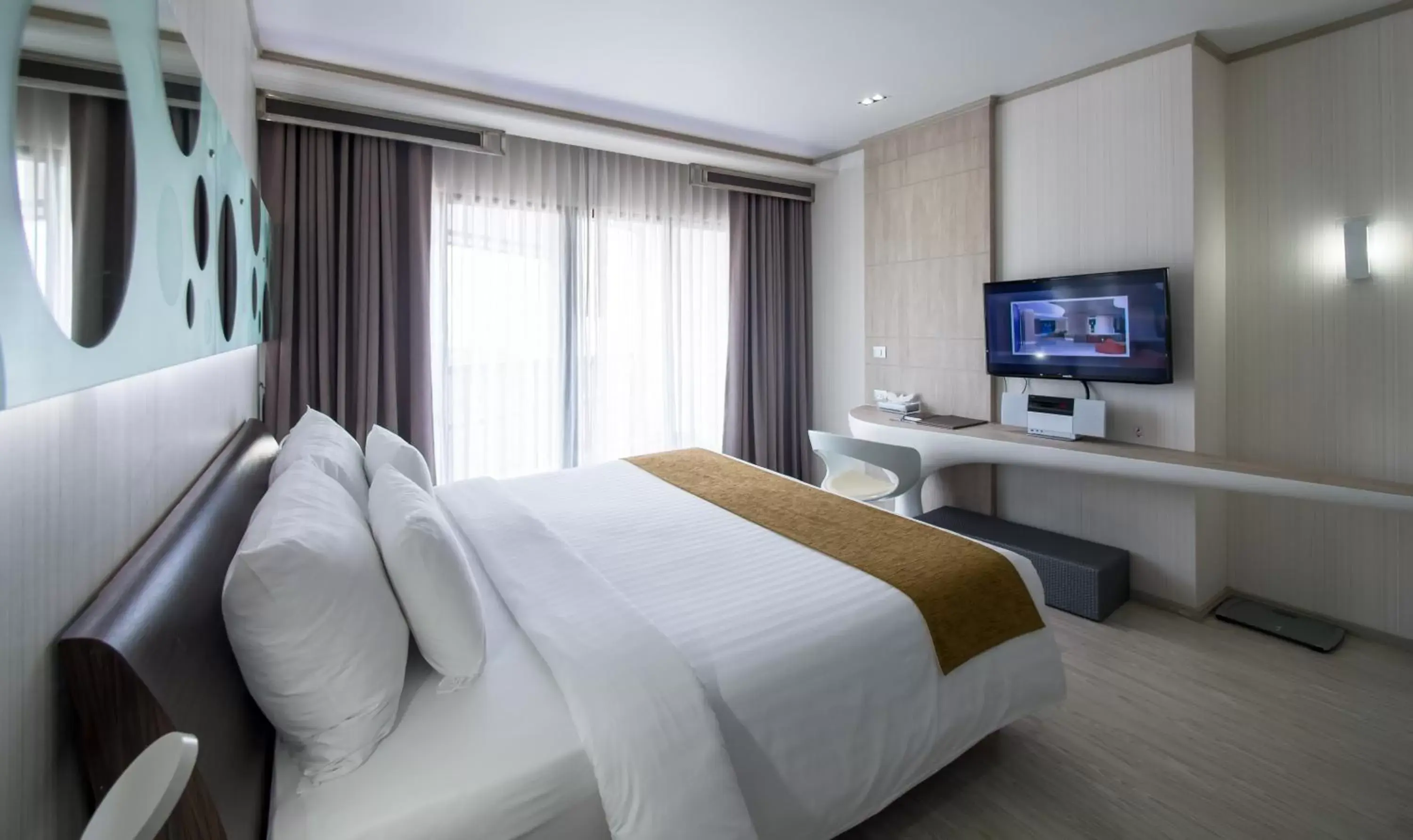 Bed in Pattaya Discovery Beach Hotel - SHA Extra Plus