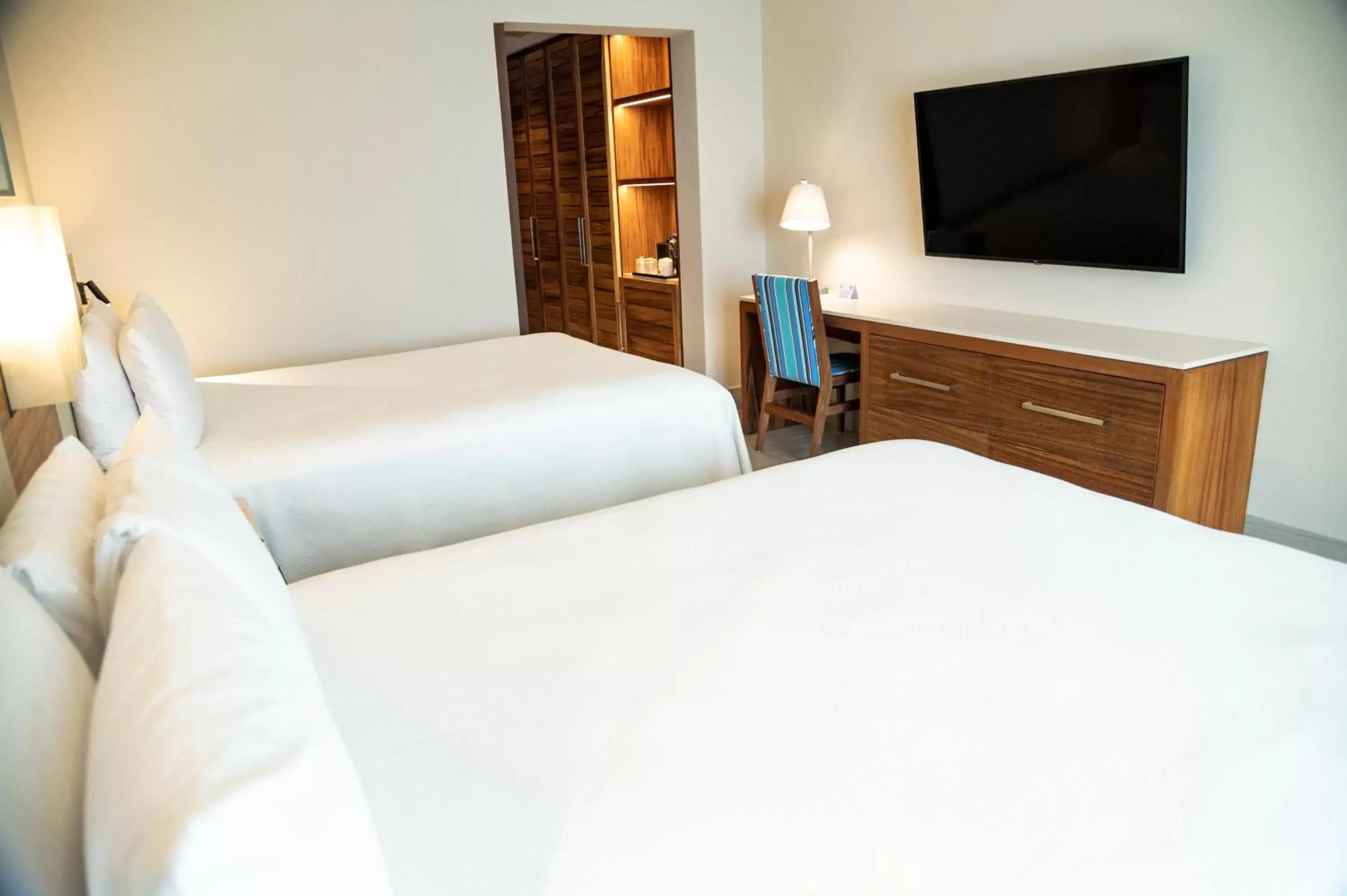 Bed in Emporio Cancun - Optional All Inclusive